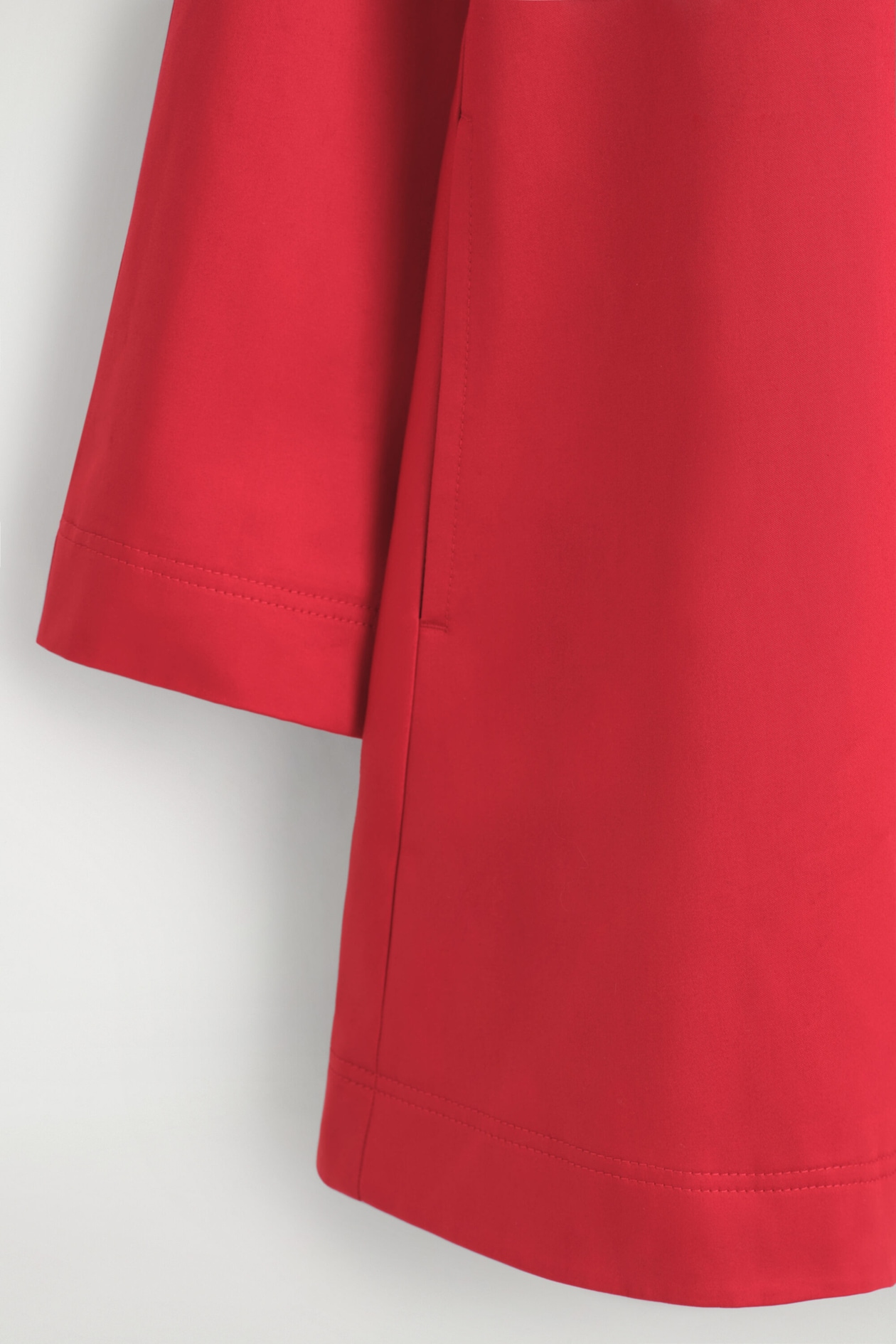 SCULPTURAL COTTON SWING COAT — RED