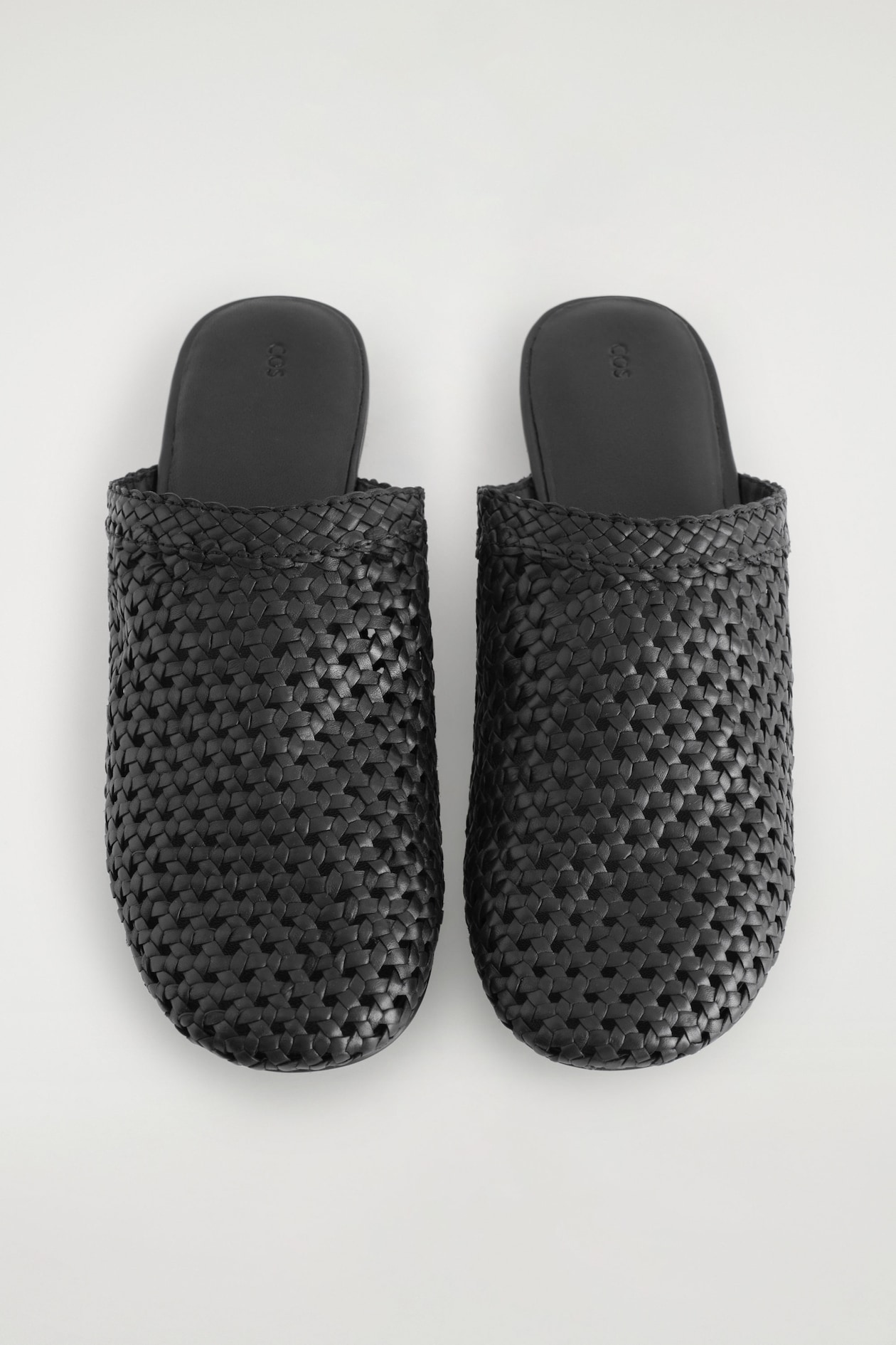 BRAIDED LEATHER MULES — BLACK