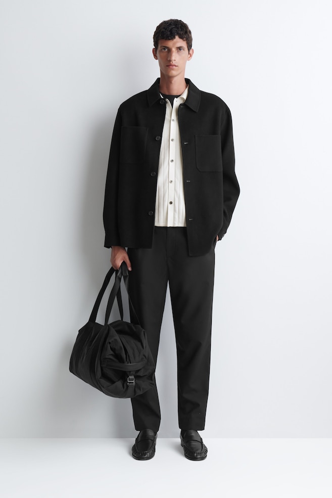 LEATHER-DETAIL DUFFEL BAG - NYLON — BLACK