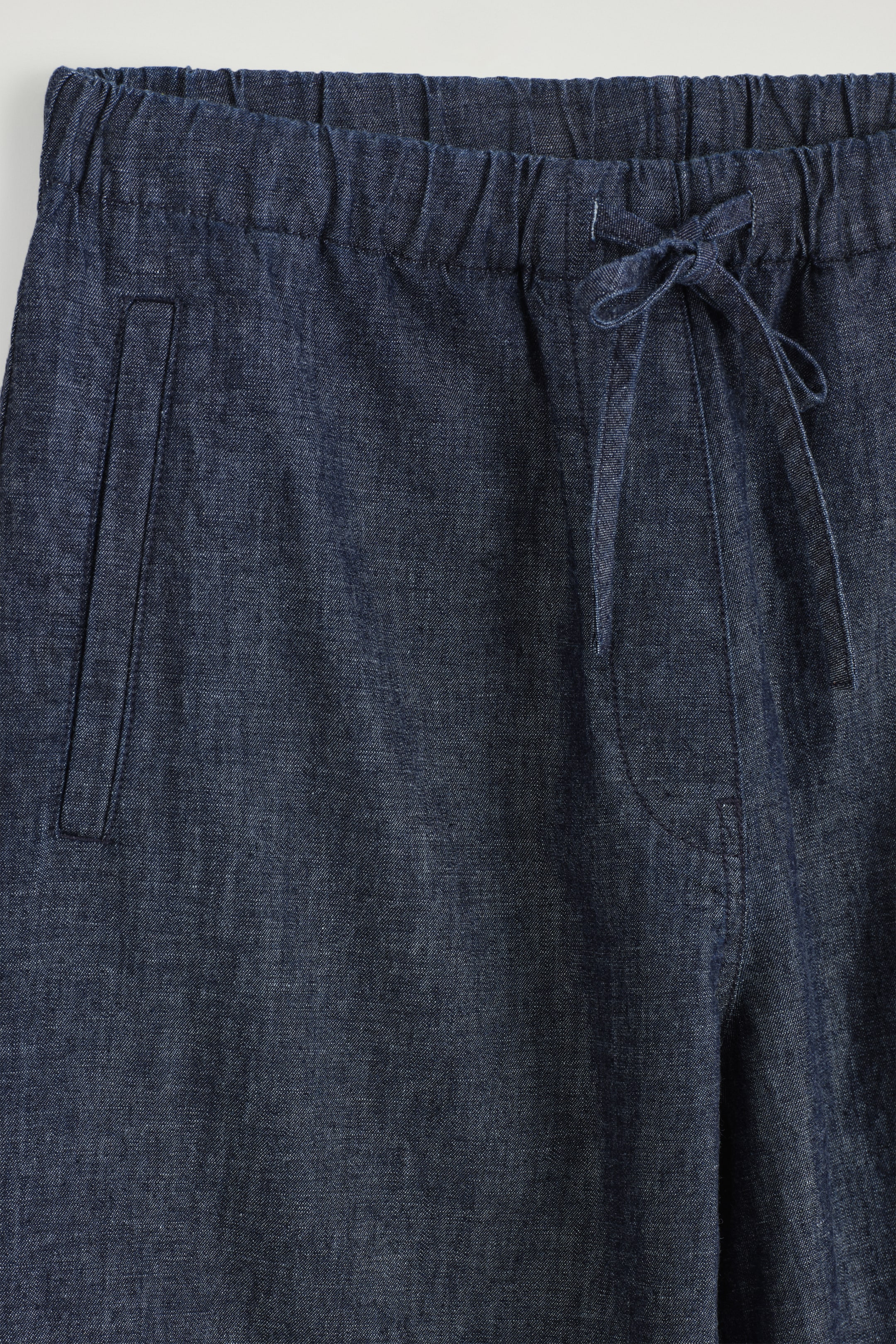 Grotere afbeelding bekijken: DENIM BROEK MET WIDE-LEG EN TREKKOORD - INDIGO - DAMES | H&M BE 7
