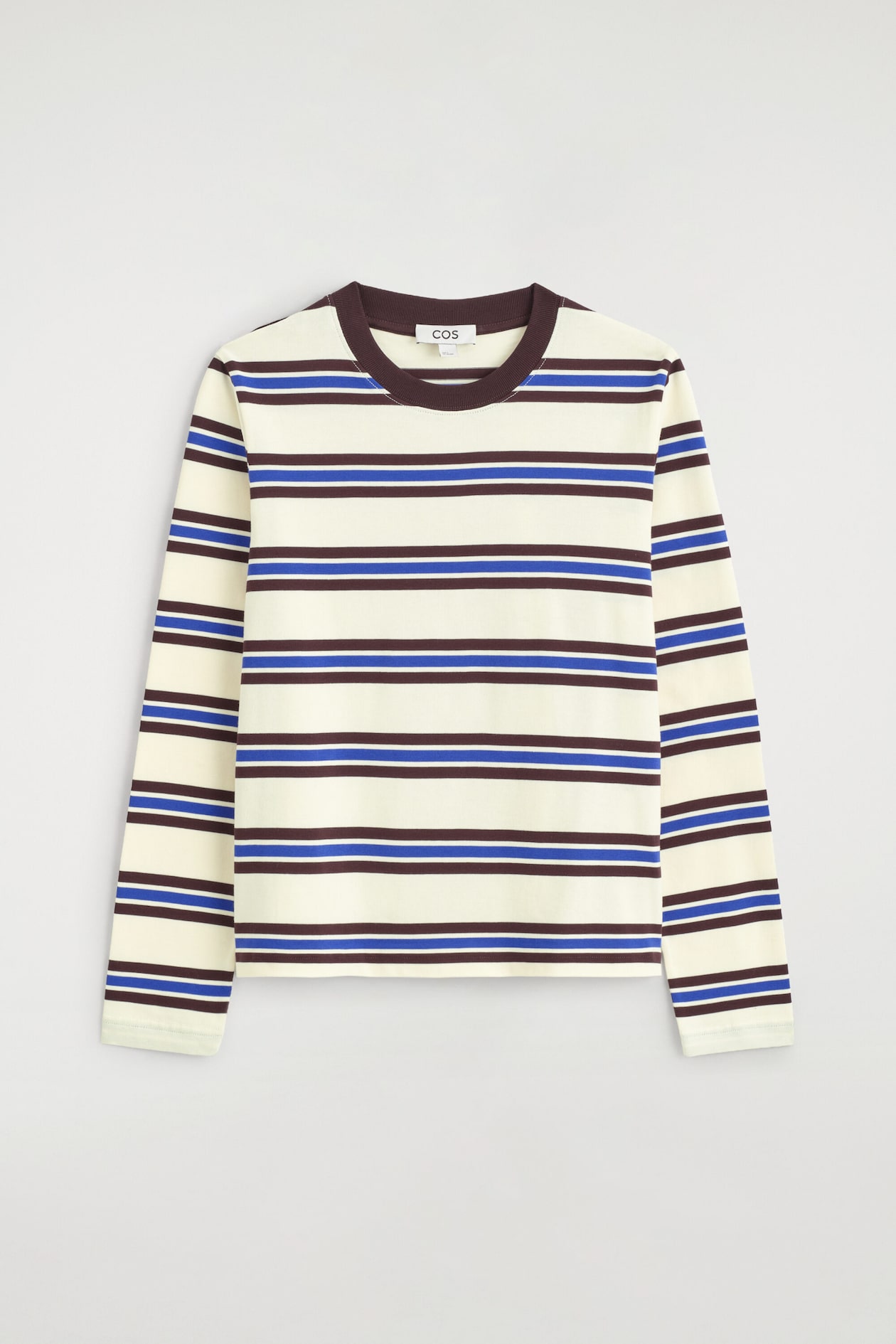 A clean-cut long-sleeved T-shirt is shown from the front, featuring horizontal stripes in dark brown and blue on an off-white background. The shirt features a solid dark brown ribbed crew neck, long sleeves, and a straight hem.