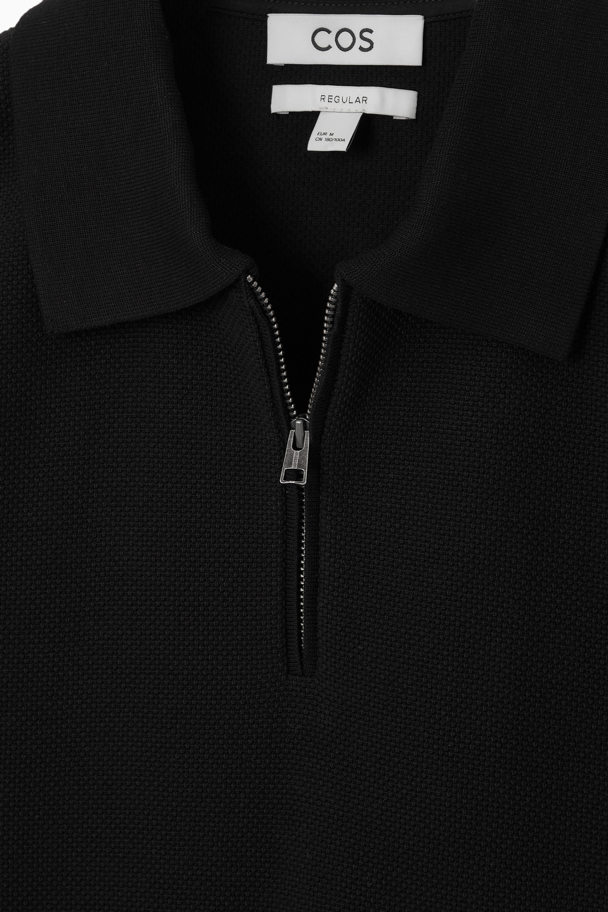 SHORT-SLEEVED ZIP-UP POLO SHIRT - BLACK | COS