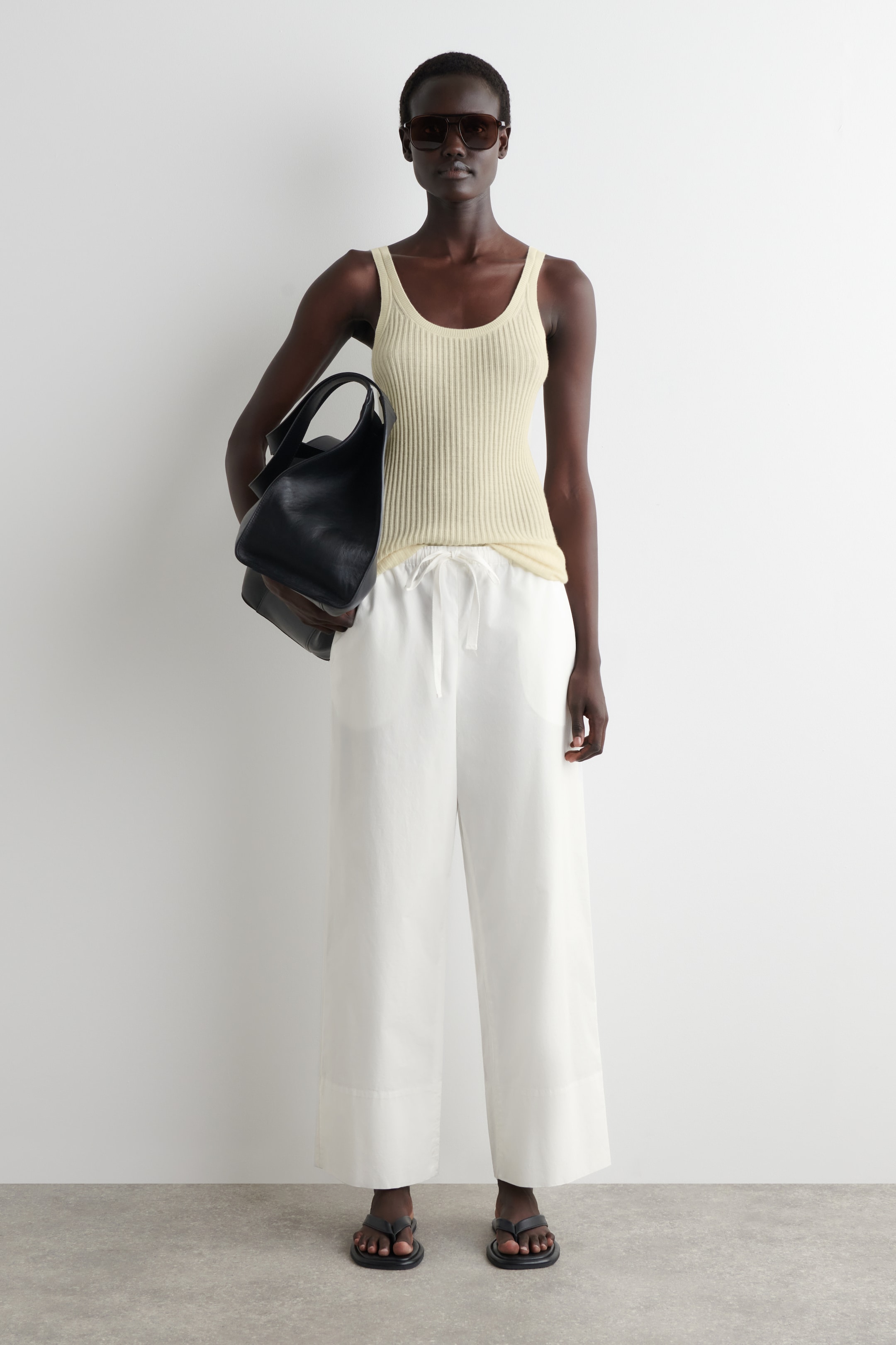 Grotere afbeelding bekijken: TREKKOORD KATOENEN BROEK - WIT - DAMES | H&M BE 1