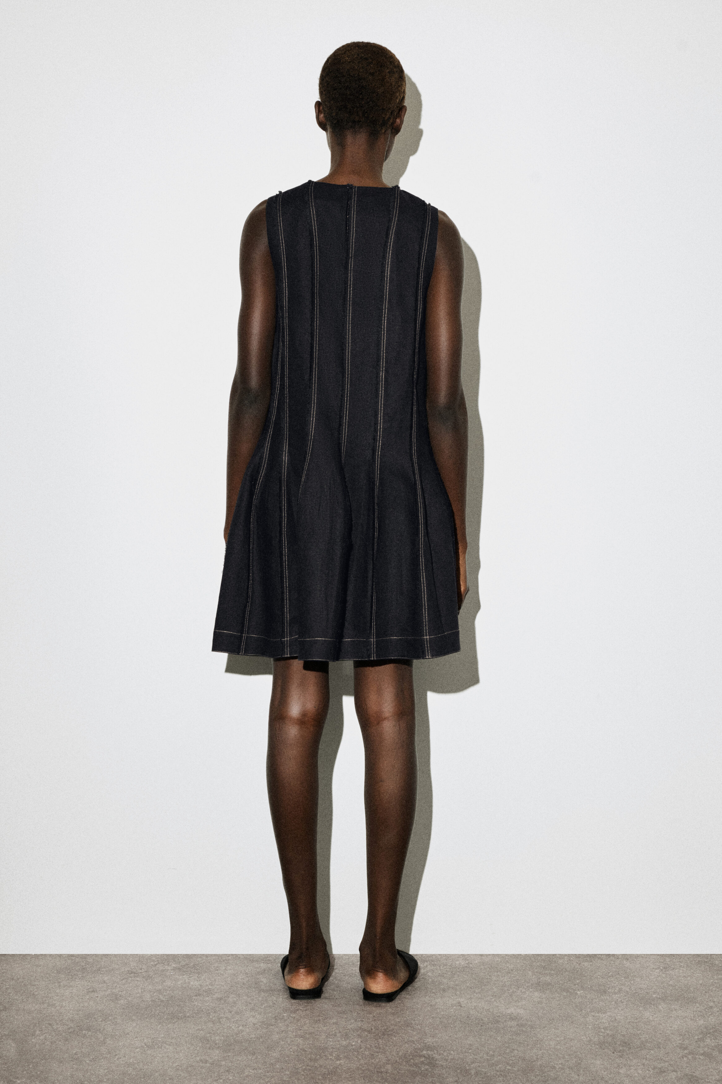 SCULPTED PLEATED MINI DRESS - BLACK | COS US