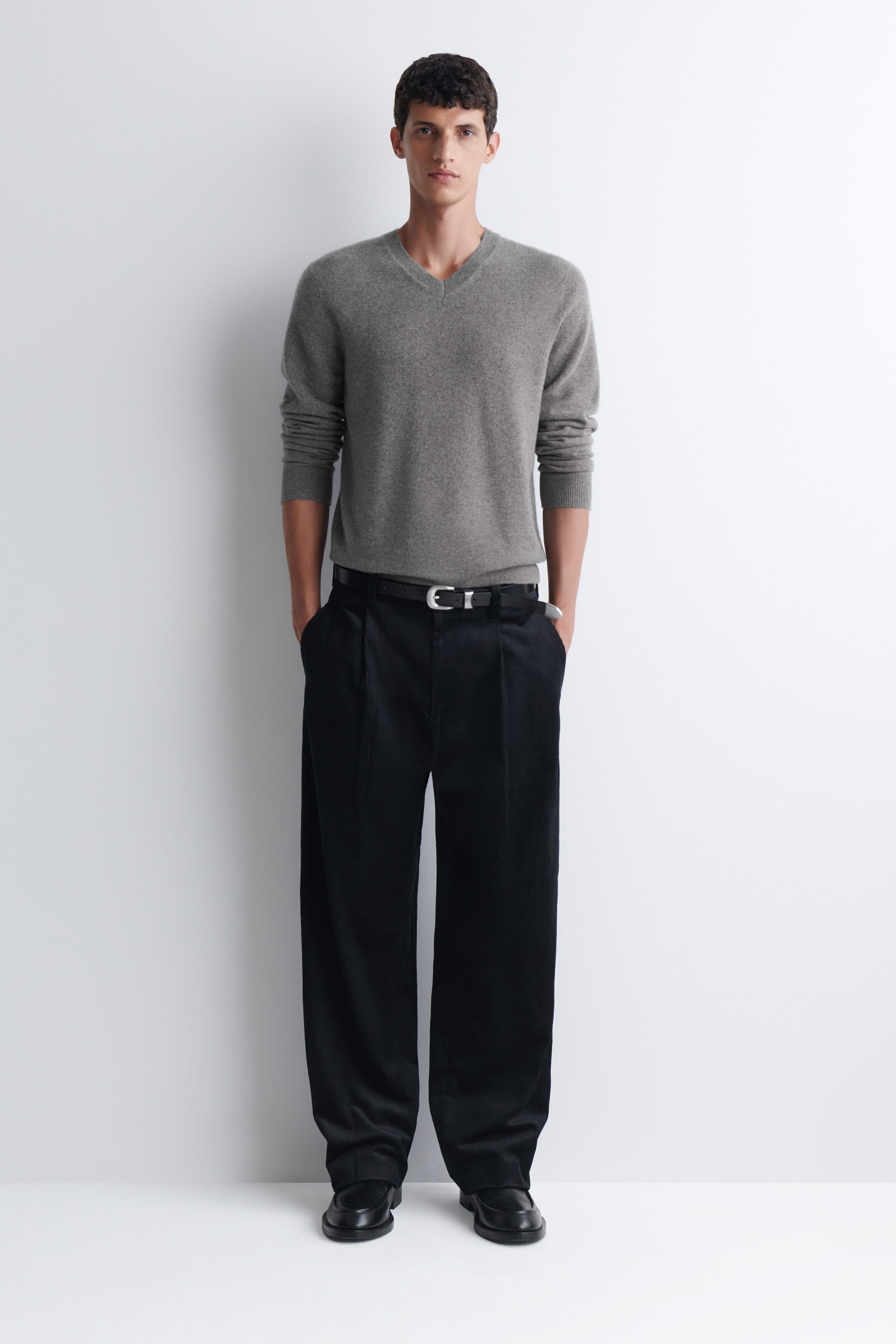 PLEATED RELAXED-FIT TAPERED CORDUROY PANTS - BLACK | COS US