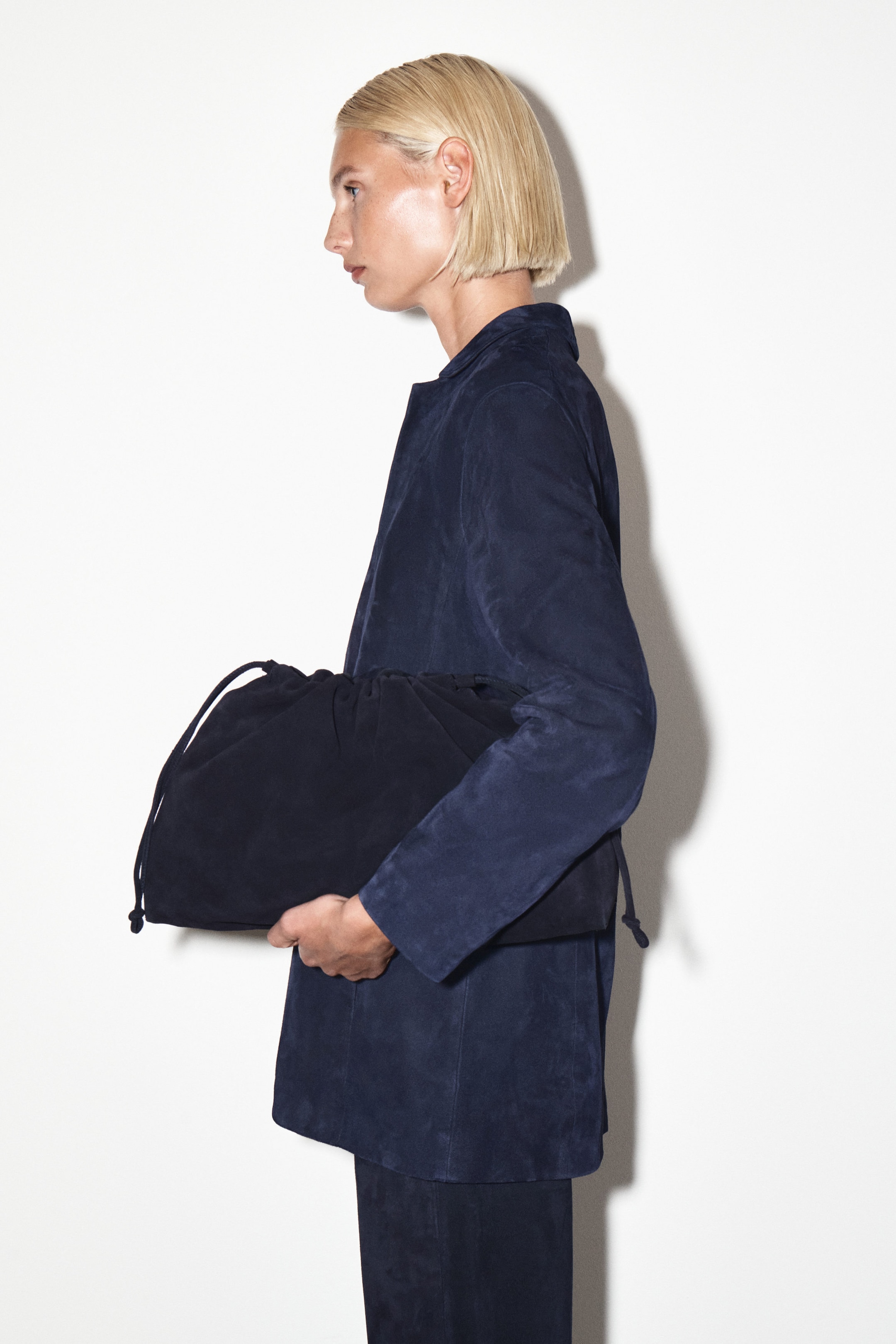 CAVATELLI CLUTCH BAG - SUEDE