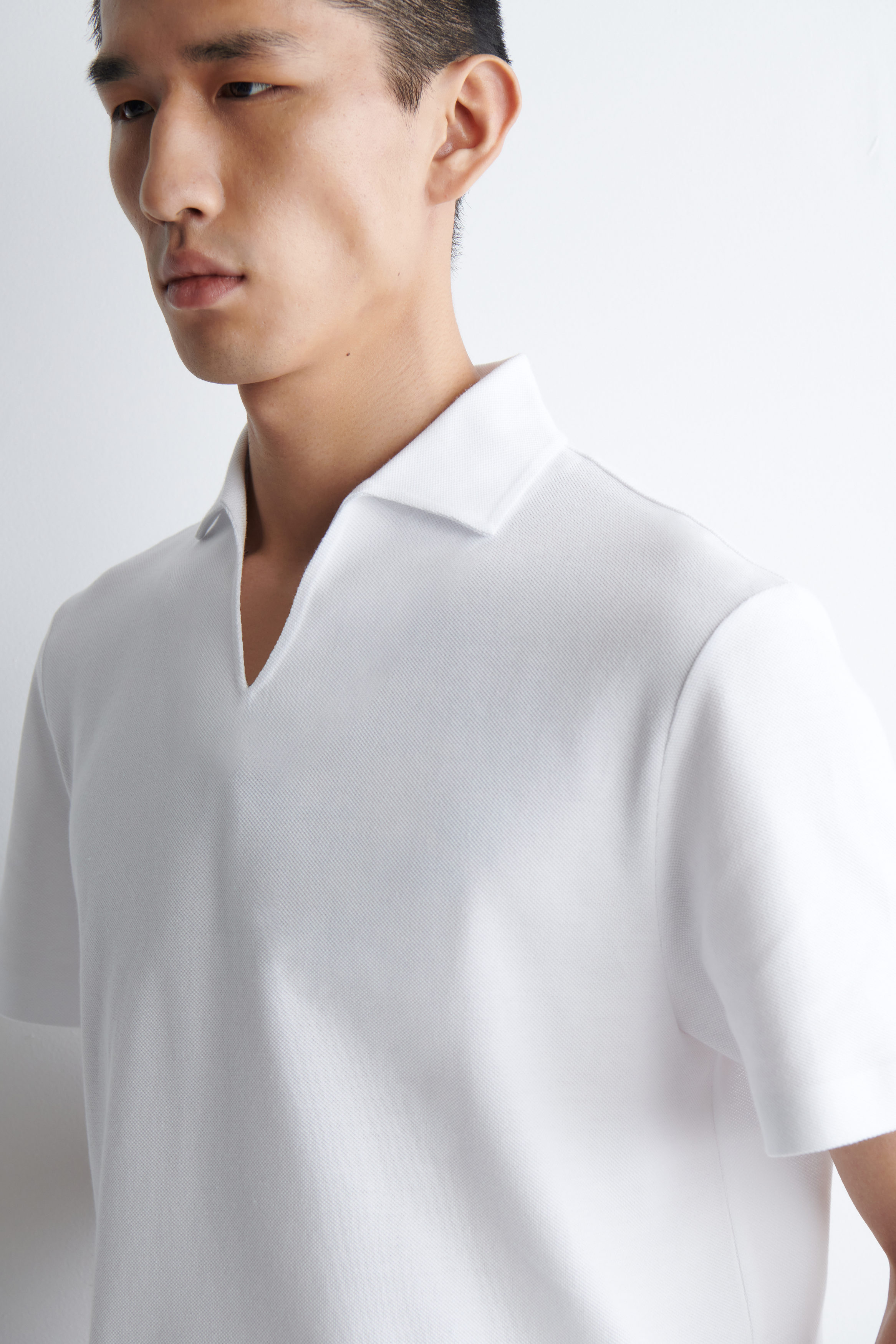 トップス Pique Polo Knit Top white Piqué regular polo shirt with triangular structure - white