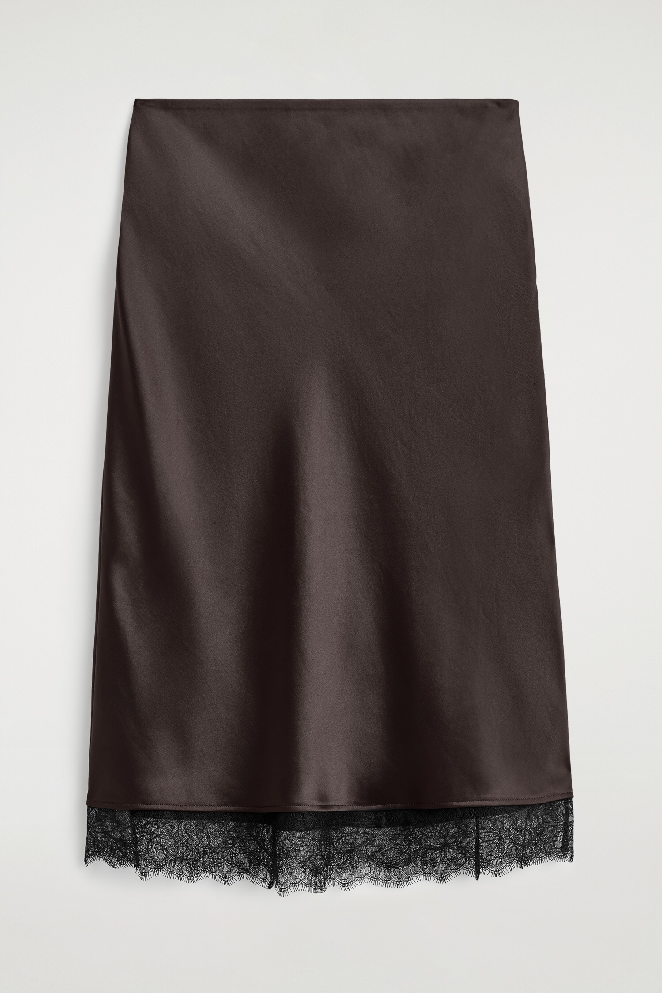 View larger image: A chocolate-toned satin midi skirt is presenting, featuring a black lace trim along the hem.