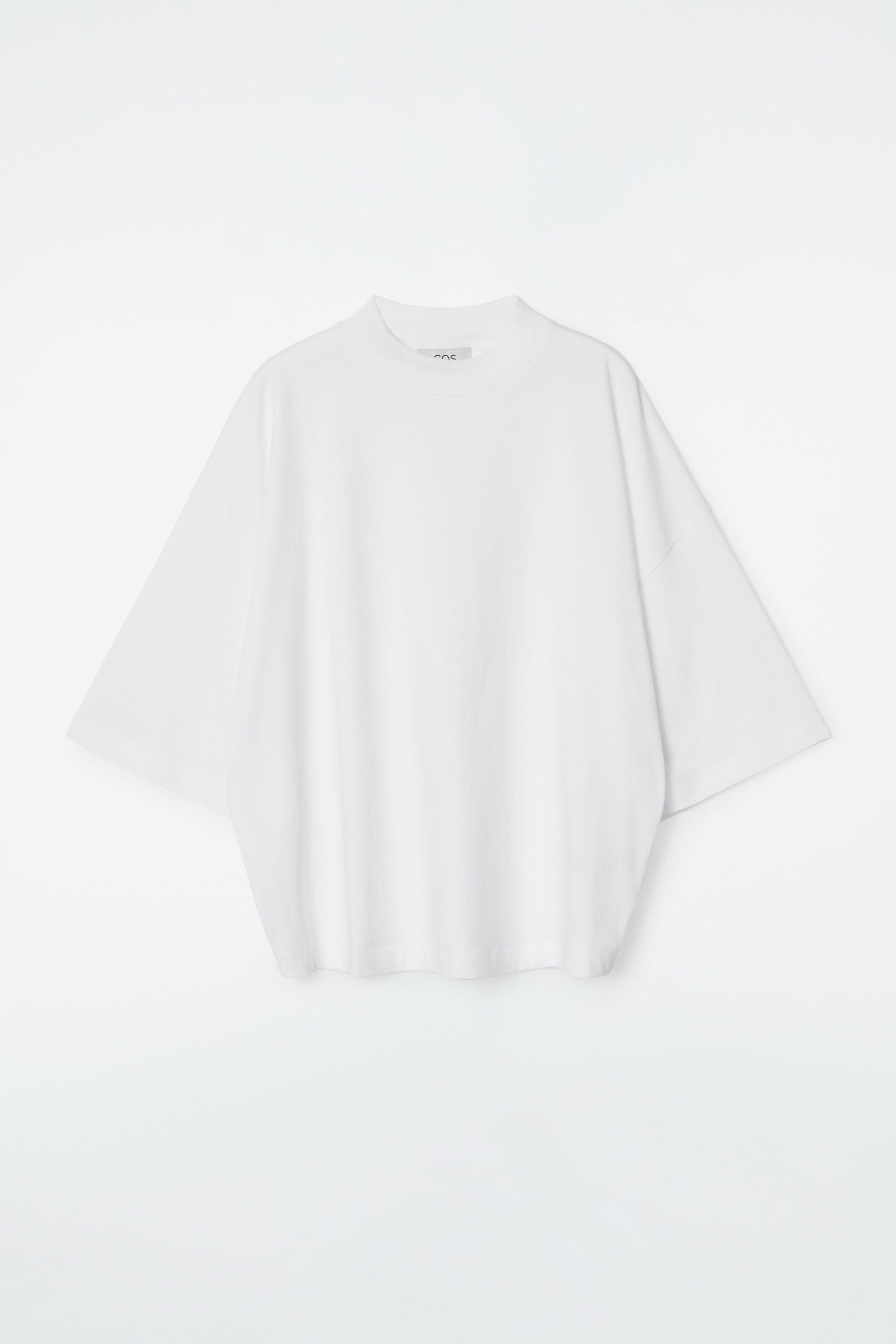 STRUKTURERAD T-SHIRT MED HALVPOLO