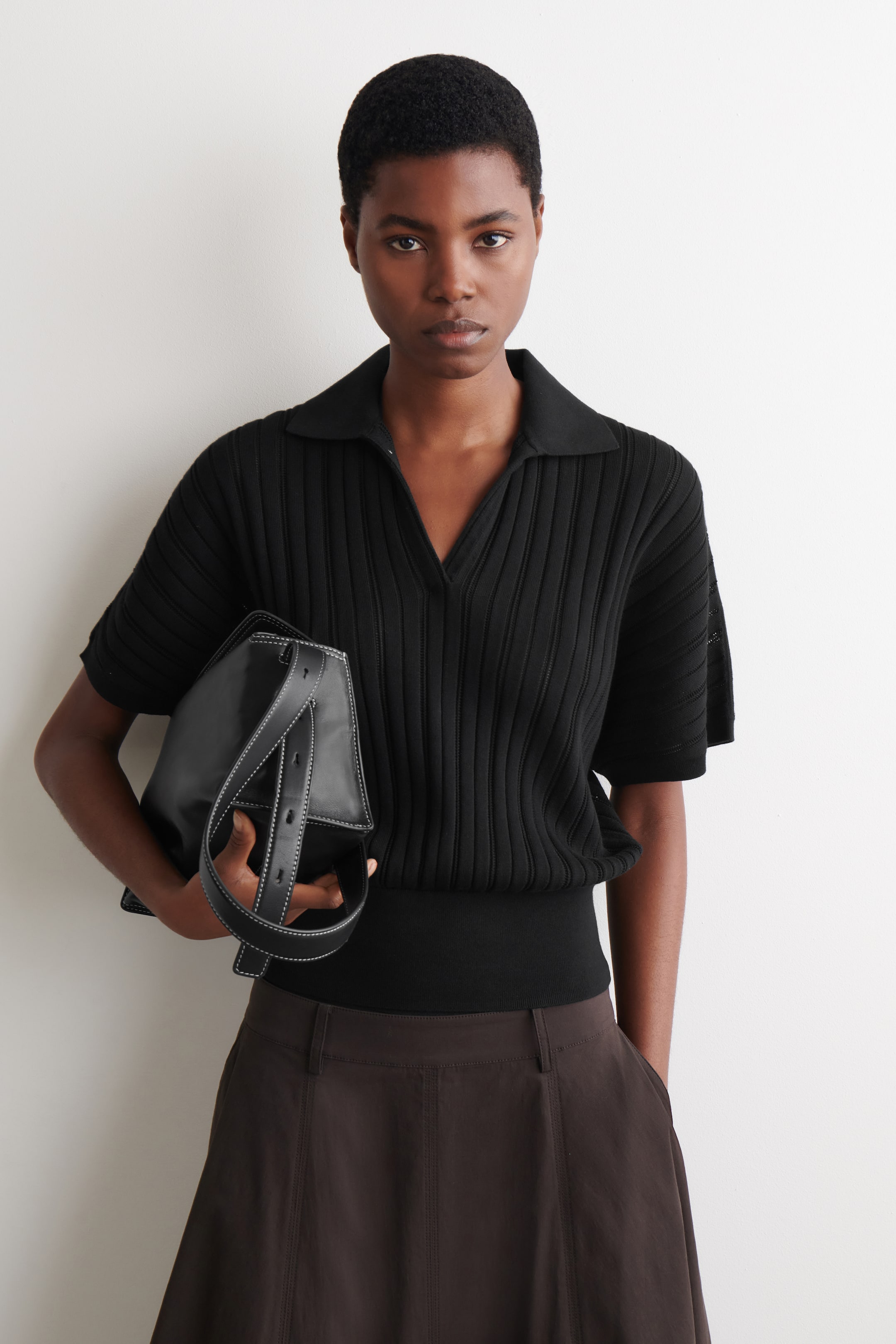 Größeres Bild ansehen: POLO-OBERTEIL AUS BAUMWOLLE IN POINTELLE-OPTIK - SCHWARZ - Ladies | H&M DE 1