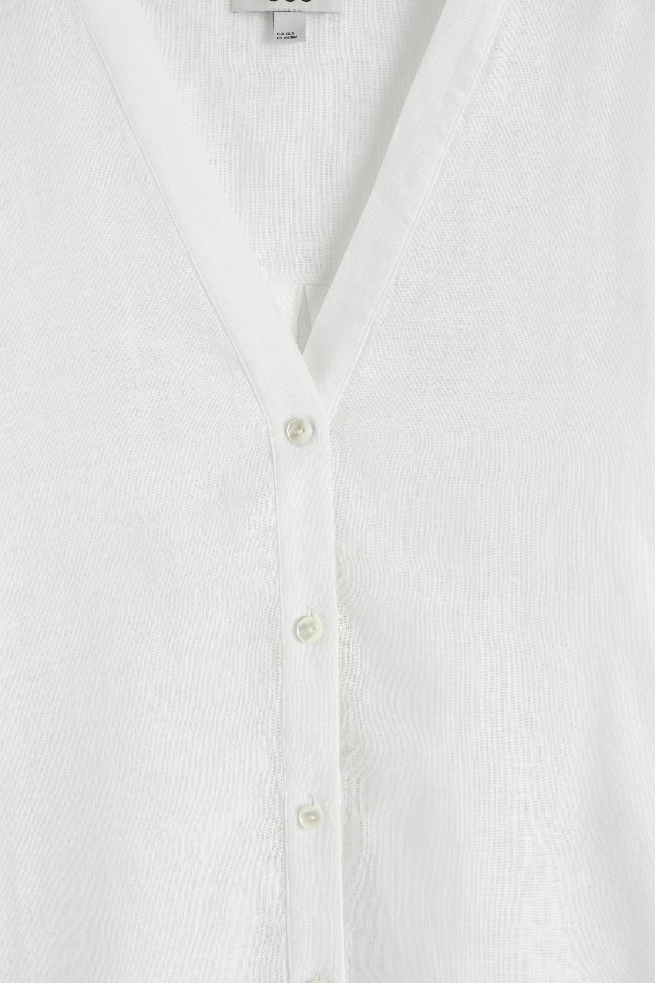 Grotere afbeelding bekijken: OVERSIZED LINNEN V-HALS OVERHEMD - WIT - DAMES | H&M BE 8