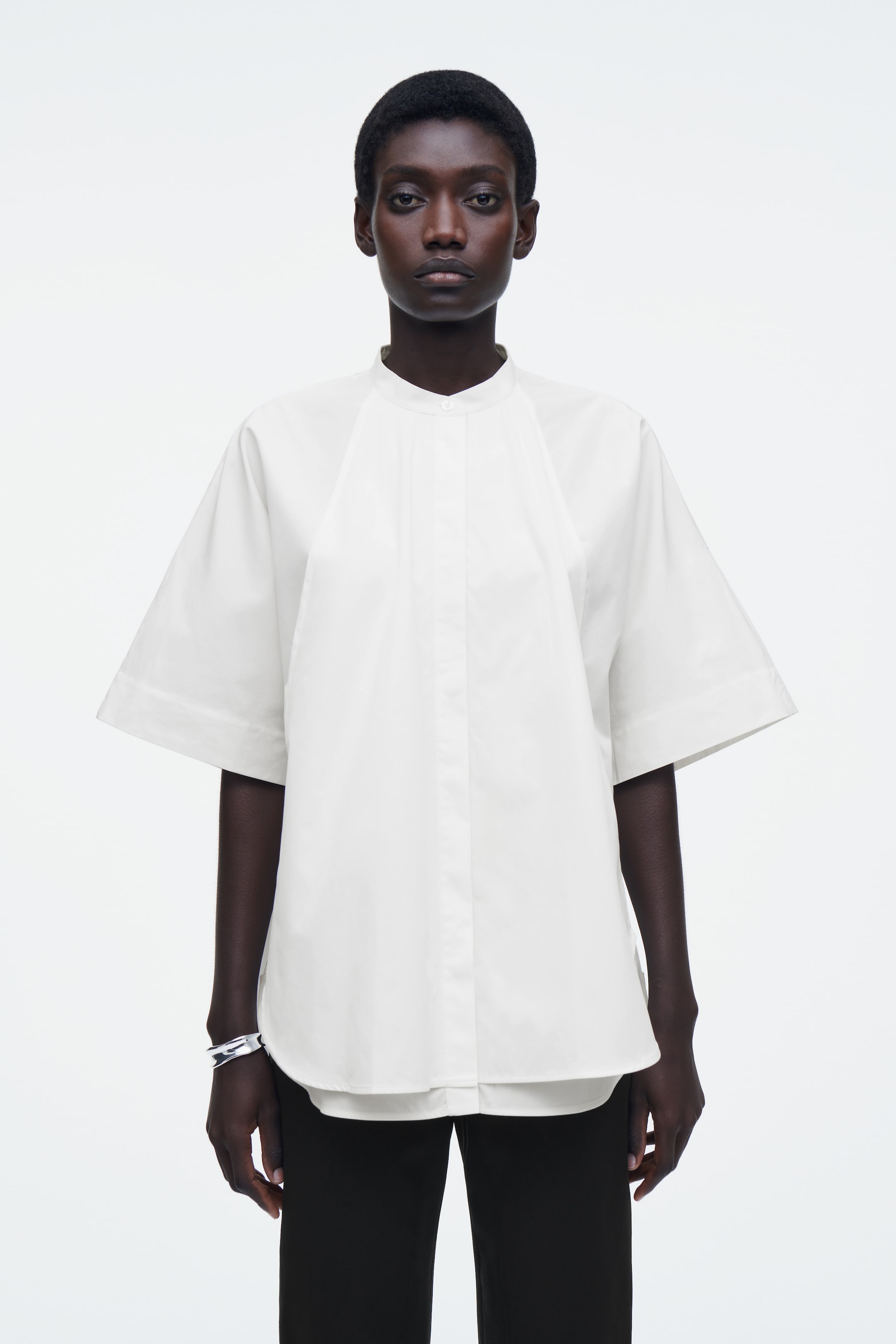 Visualizza immagine più grande: CAMICIA OVERSIZE IN COTONE CON ORLO CURVO - BIANCO - DONNA | H&M IT 1