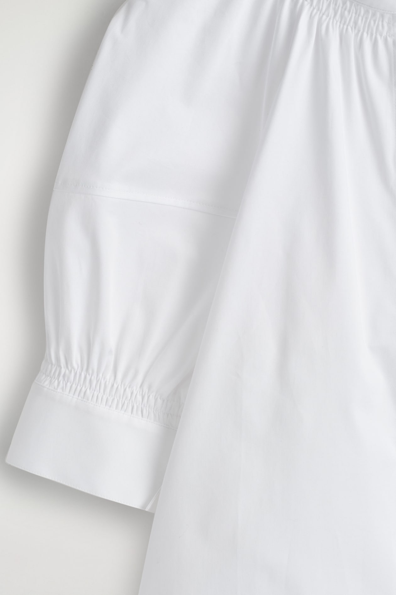 SMOCKED PUFF-SLEEVE BLOUSE