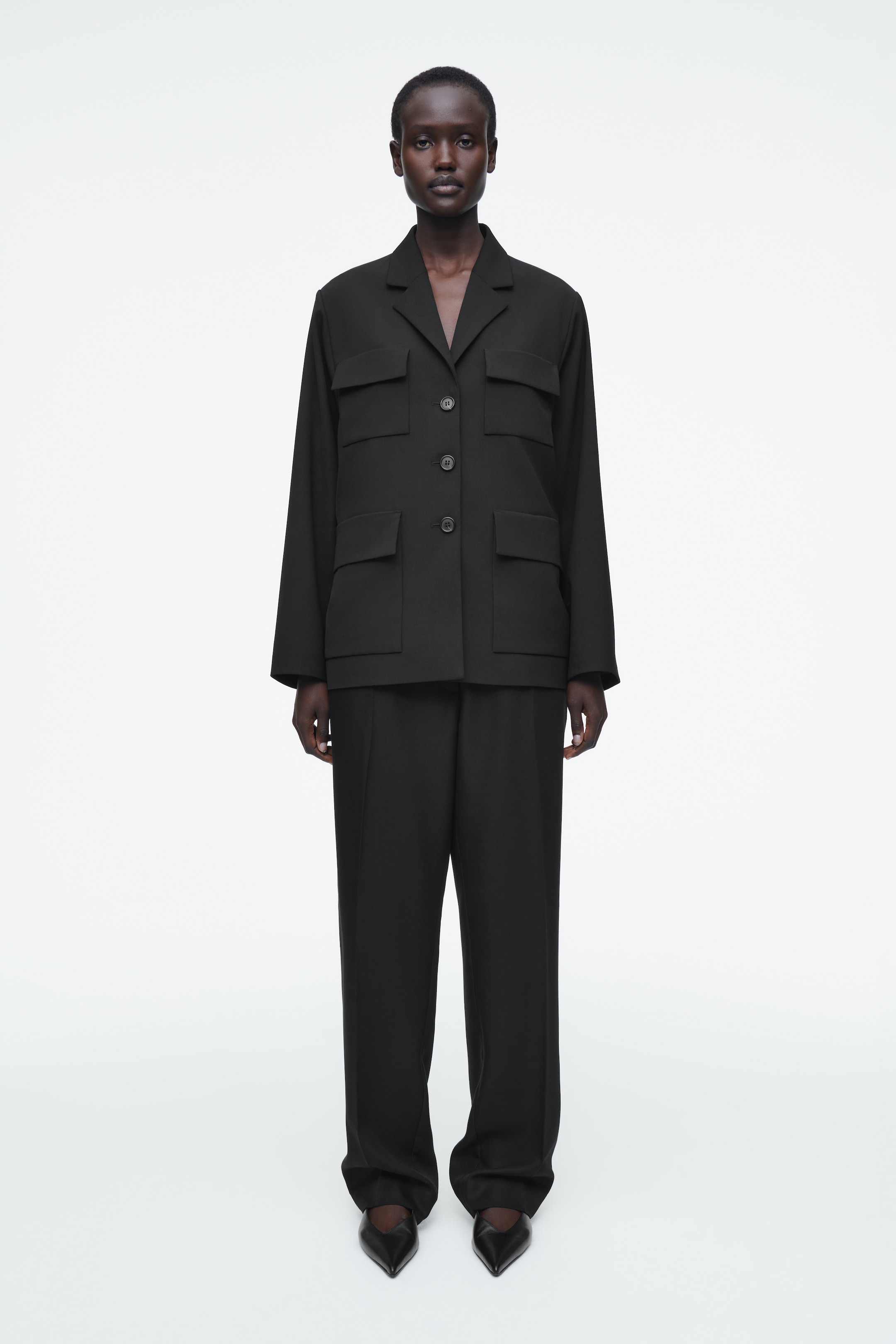 Visualizza immagine più grande: PANTALONI ELASTICIZZATI A GAMBA DRITTA - NERO - DONNA | H&M IT 1