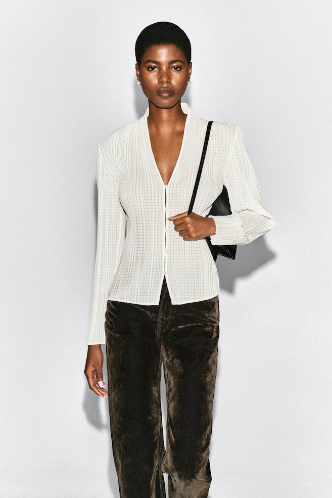 PLEATED JACQUARD CARDIGAN — WHITE