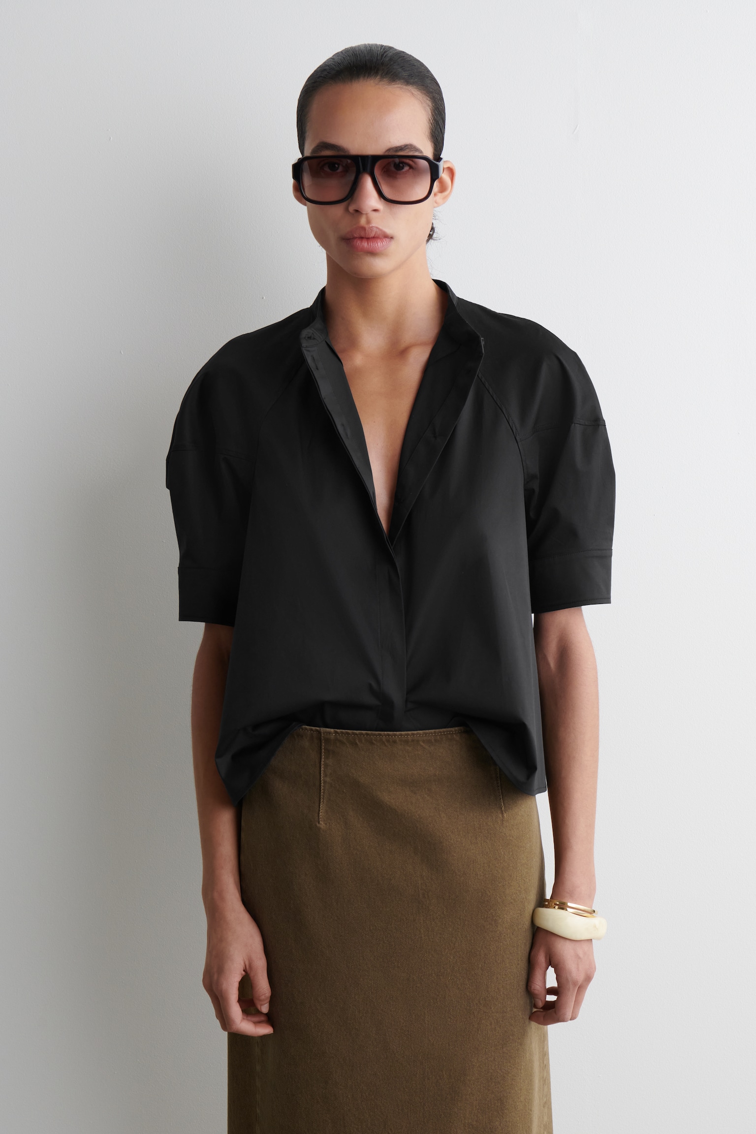 BLUSA CON MANICHE A SBUFFO - NERO/BIANCO