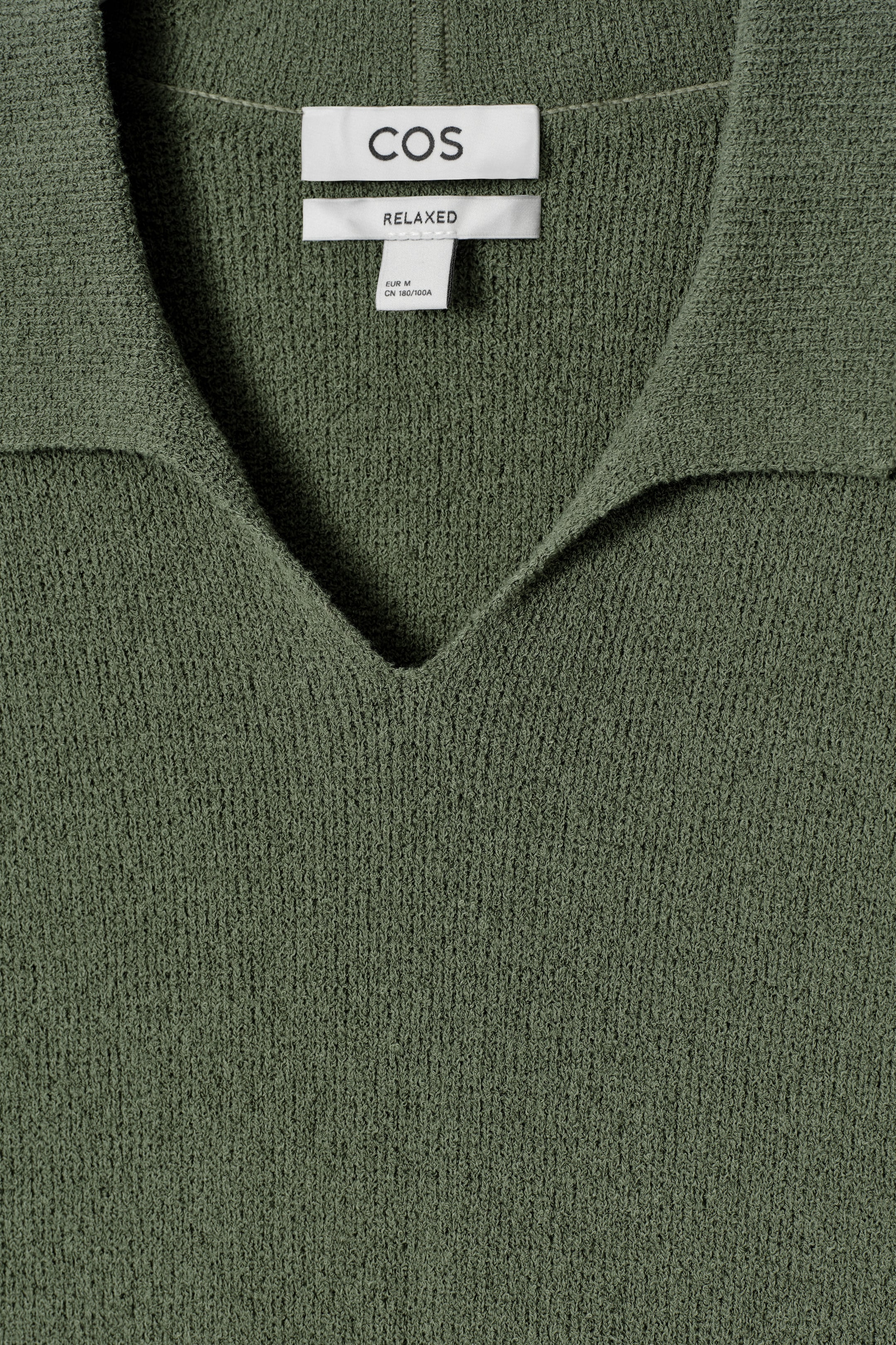 POLO IN MAGLIA BOUCLÉ CON COLLETTO APERTO
