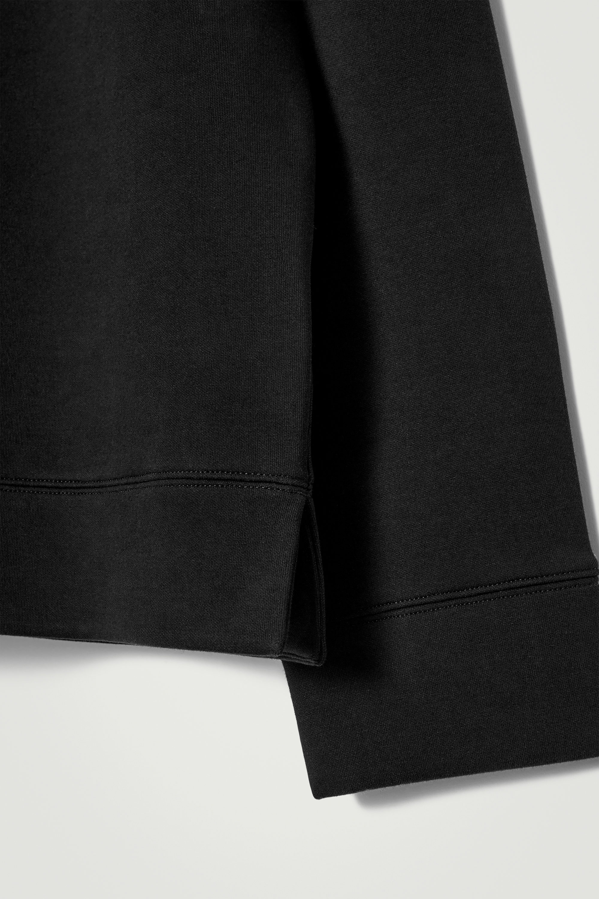 SCUBA-JERSEY HALF-ZIP POLO SHIRT - BLACK | COS US