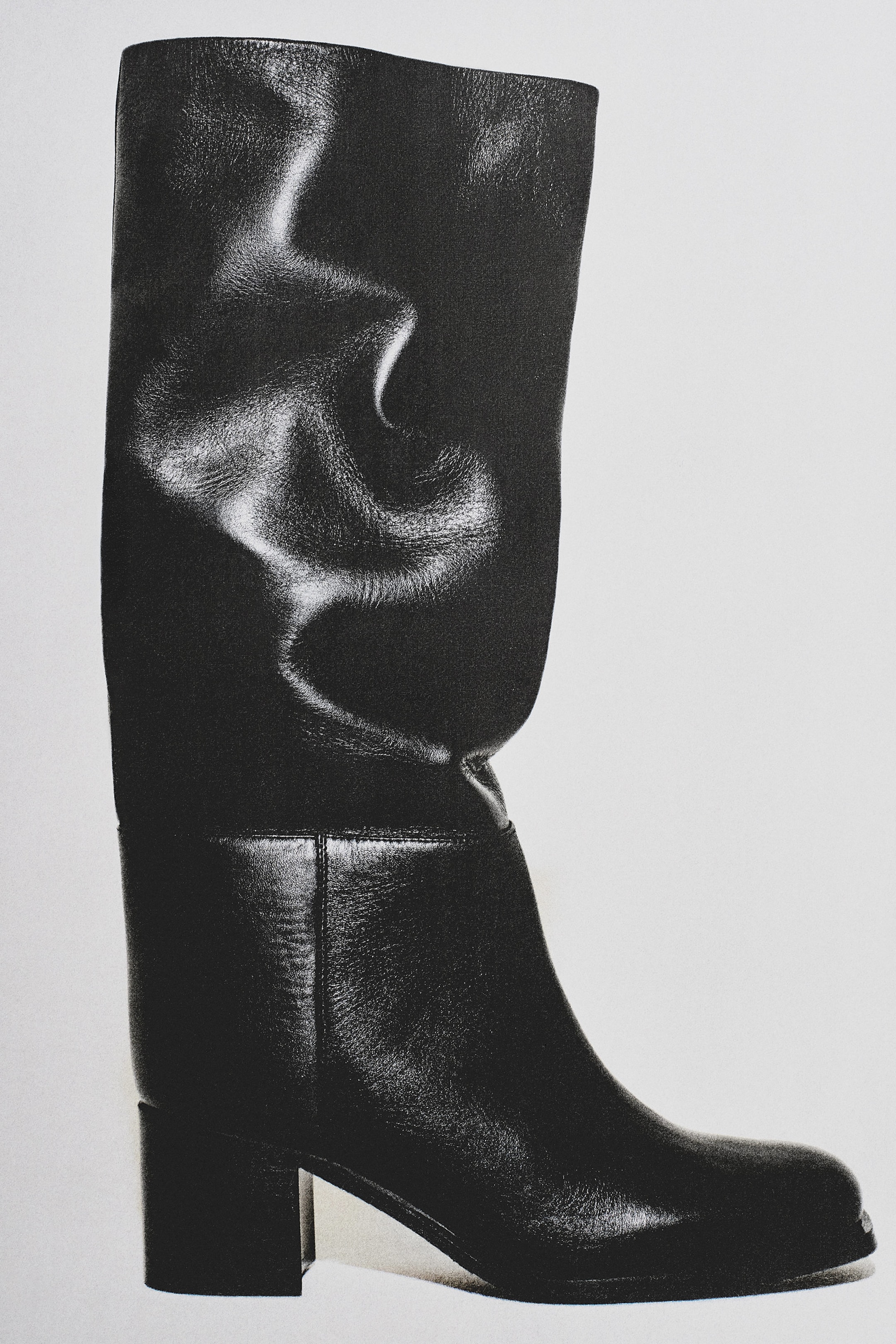 HEELED LEATHER KNEE BOOTS