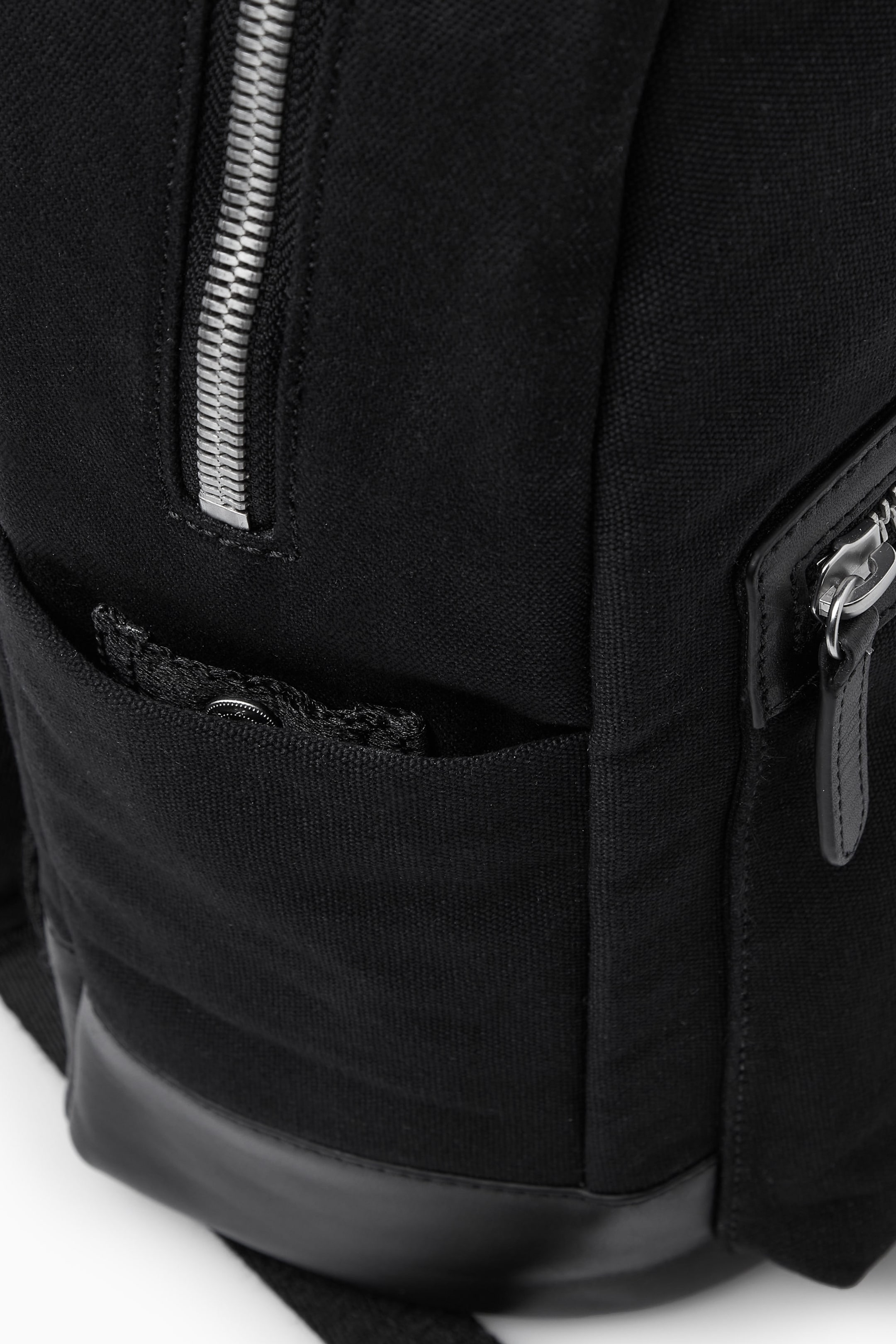 LEATHER-TRIMMED CANVAS BACKPACK