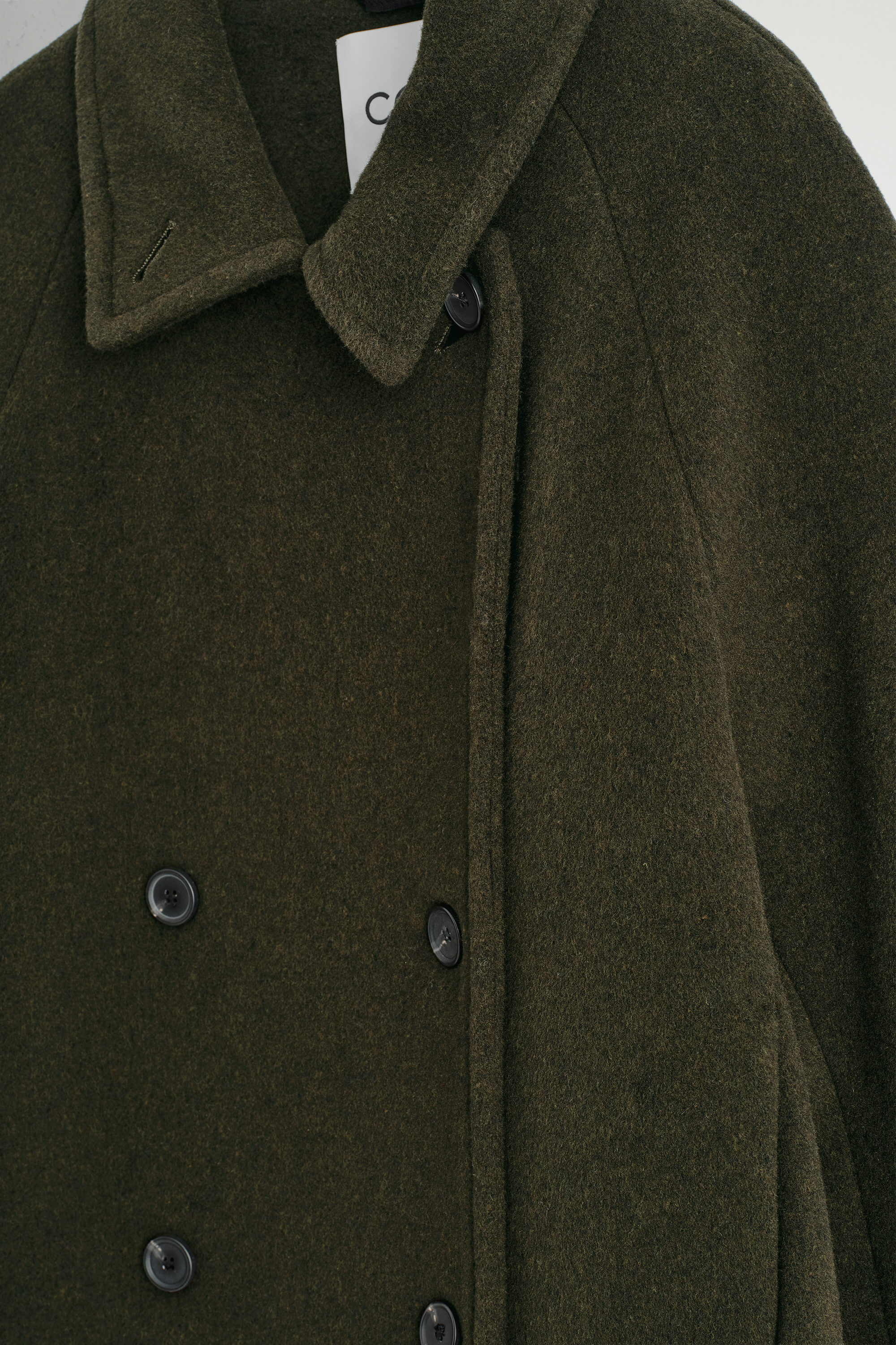 OVERSIZED DOUBLE-BREASTED WOOL LONG COAT - DARK GREEN | COS DK