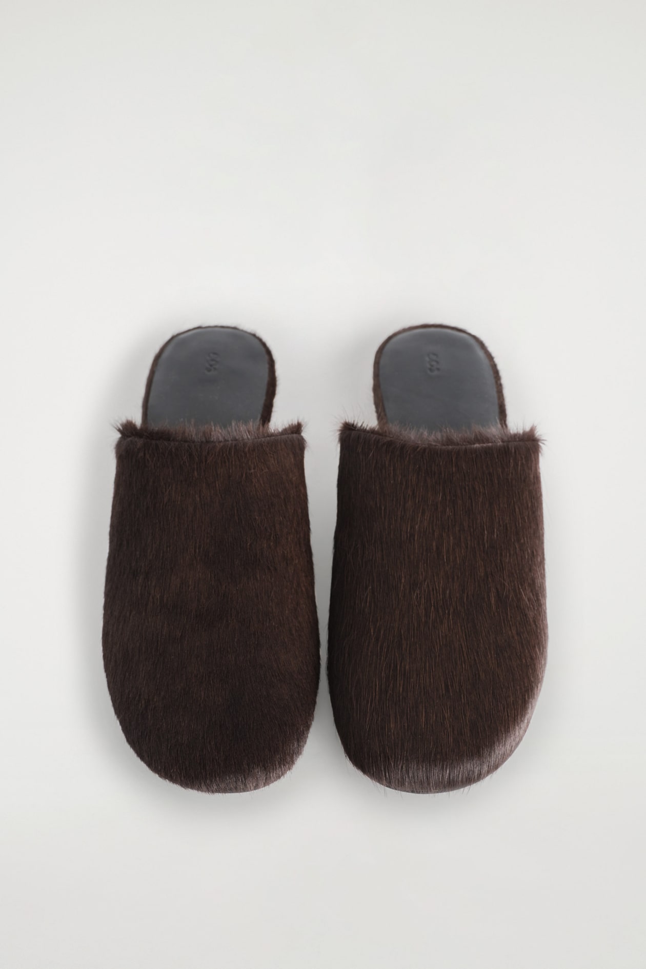 PONY HAIR-EFFECT LEATHER MULES — DARK BROWN