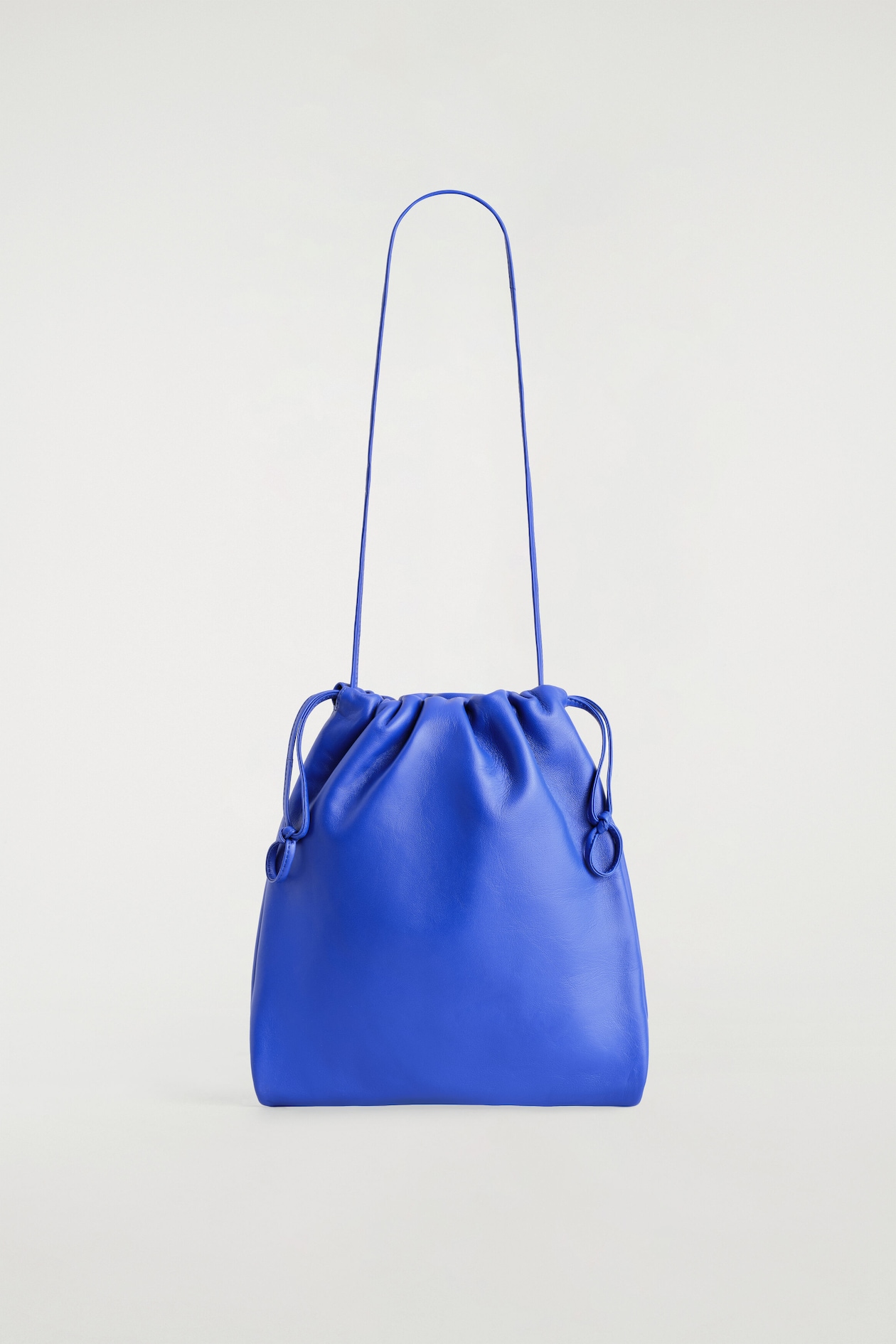DRAWSTRING CROSSBODY BAG - LEATHER — COBALT BLUE