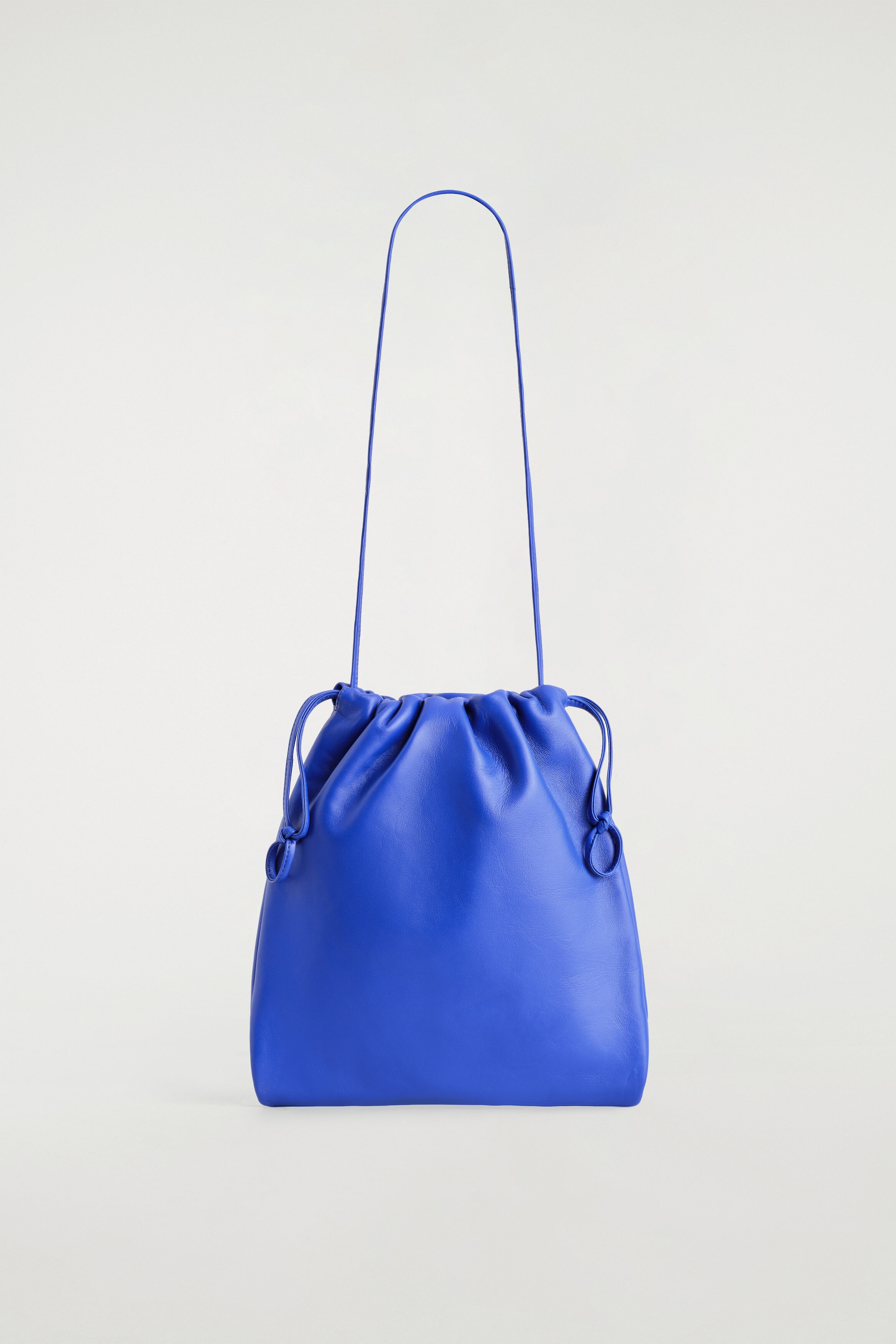 DRAWSTRING CROSSBODY BAG - LEATHER