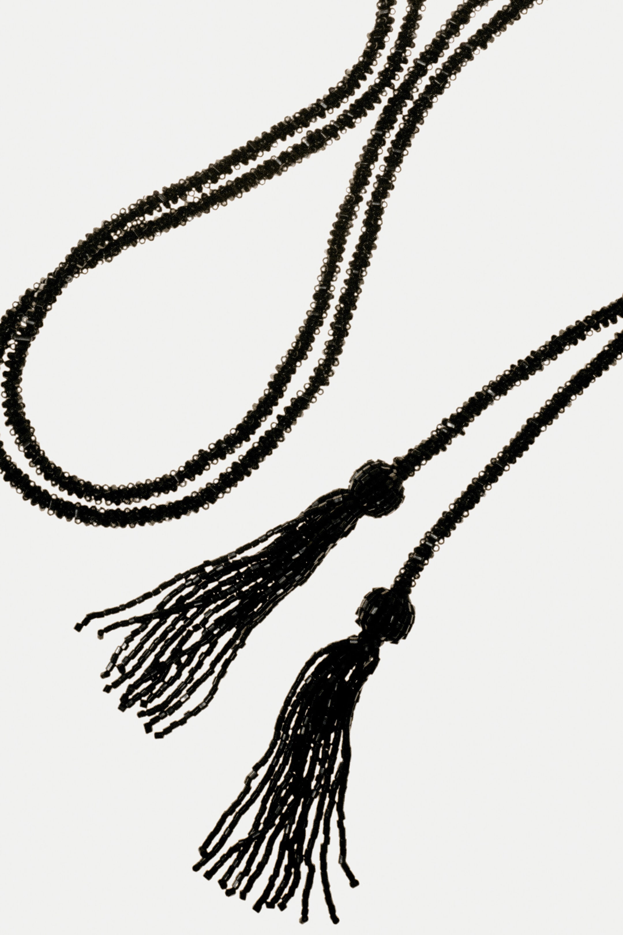 BEADED TASSEL NECKLACE