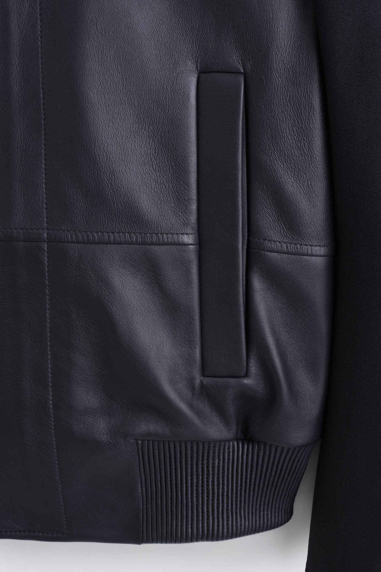 LEATHER-PANELED WOOL BOMBER JACKET — MIDNIGHT