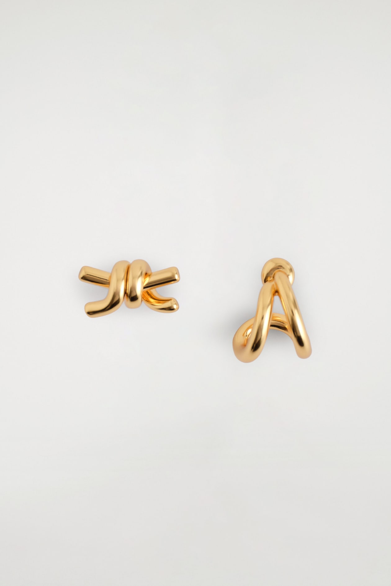MISMATCHED KNOTTED EARRINGS — GOLD