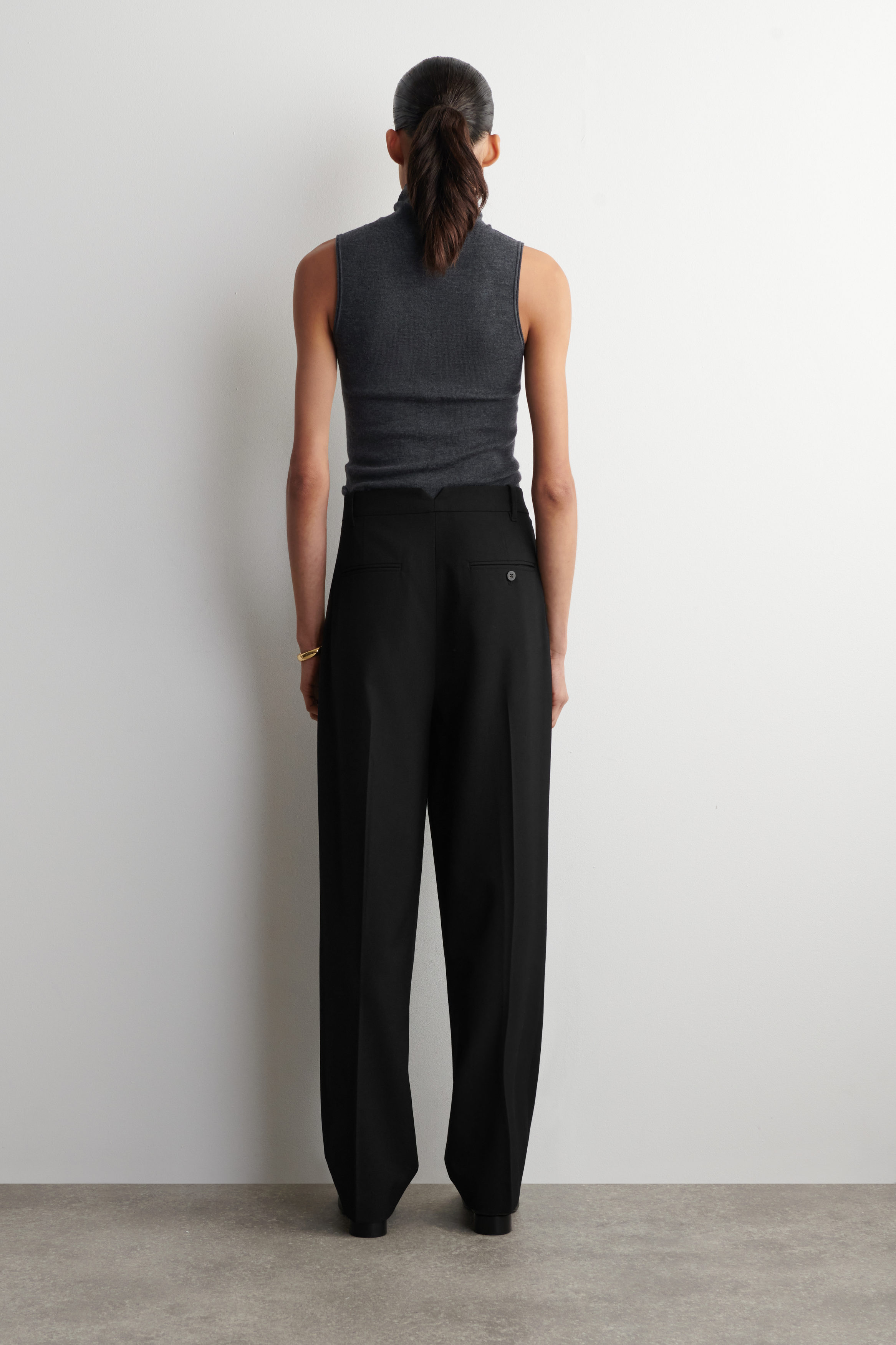 PLEATED WOOL-BLEND TAPERED PANTS - BLACK | COS GB