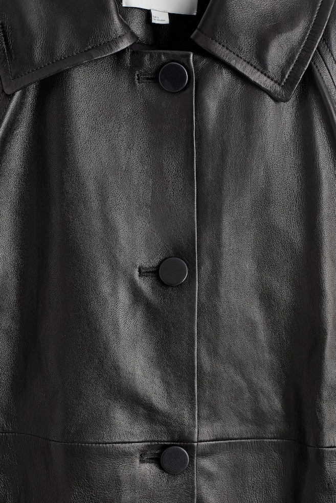SCULPTURAL LEATHER COAT — DARK BROWN