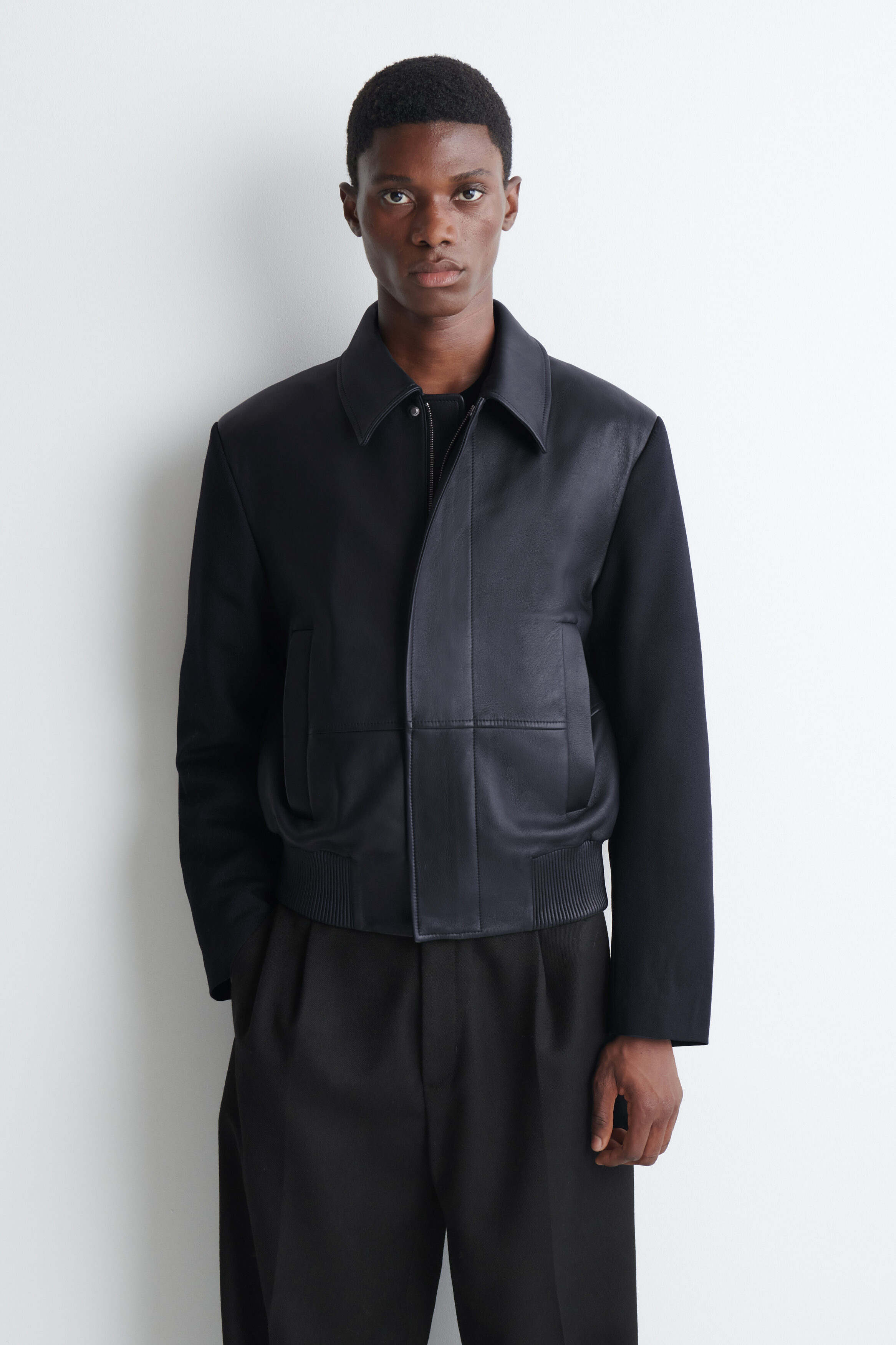 LEATHER-PANELED WOOL BOMBER JACKET