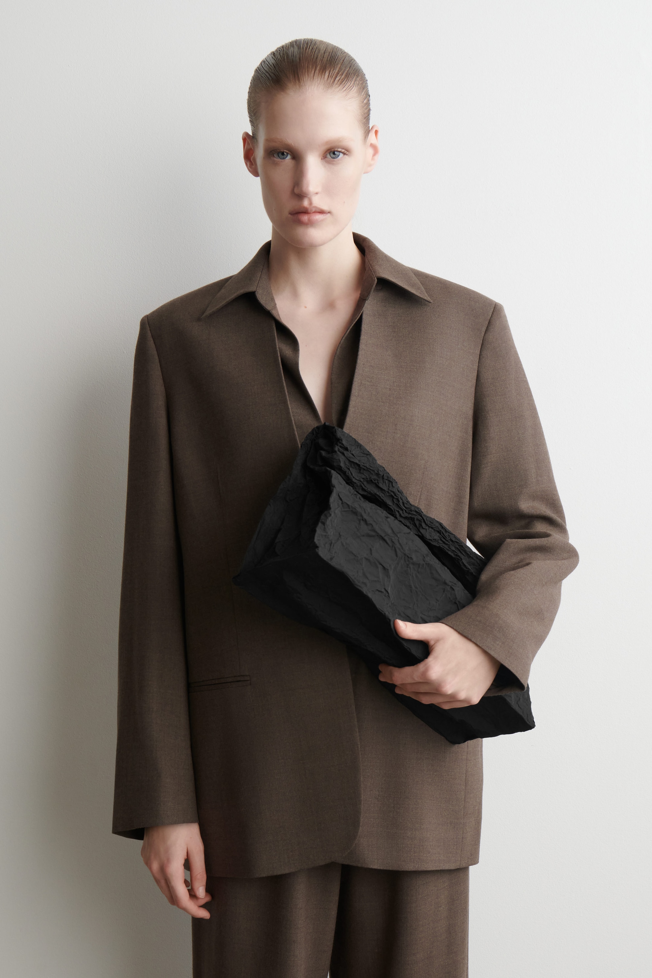 FOLDED OVERSIZED CLUTCH BAG