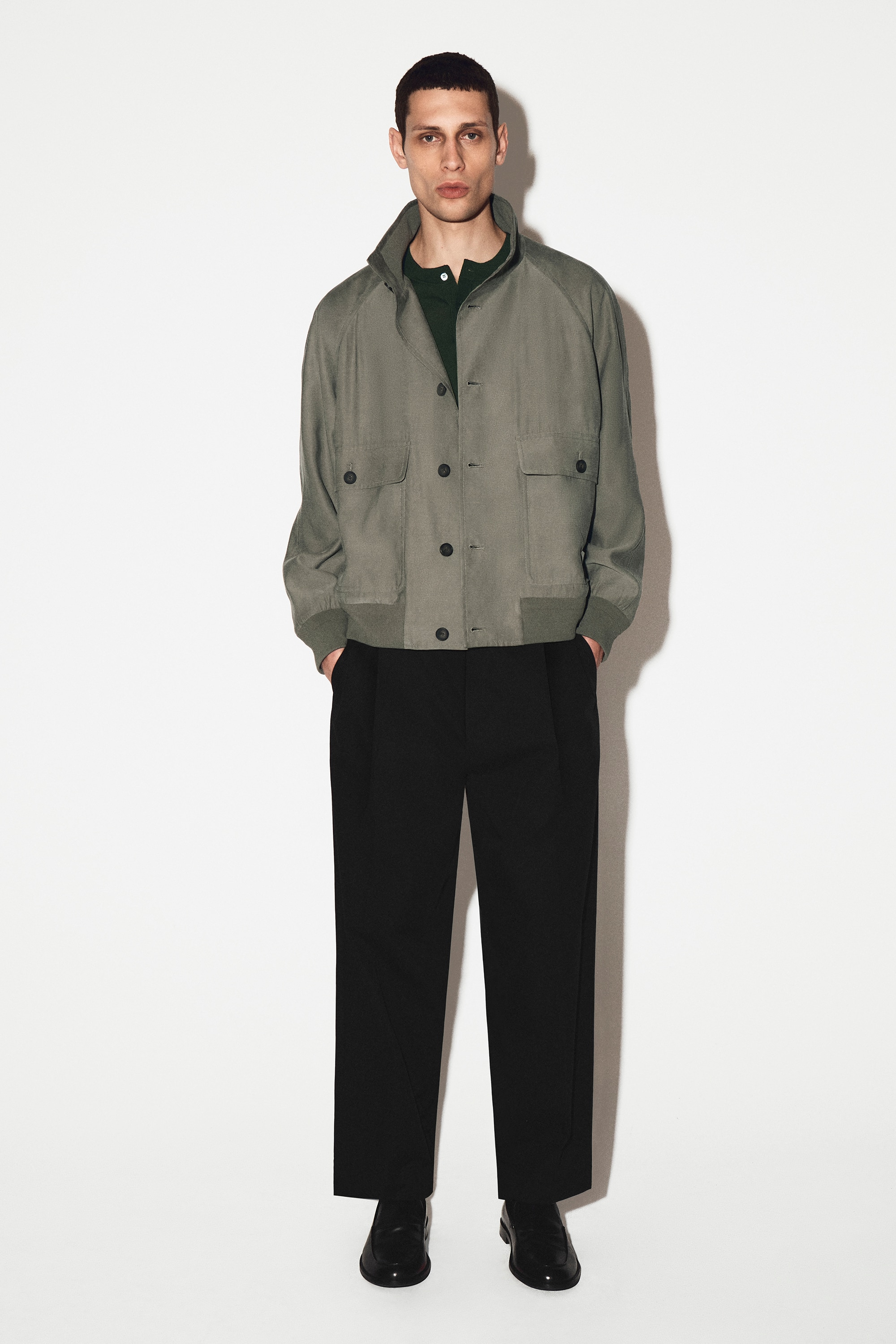 PLEATED RELAXED-FIT TAPERED TROUSERS