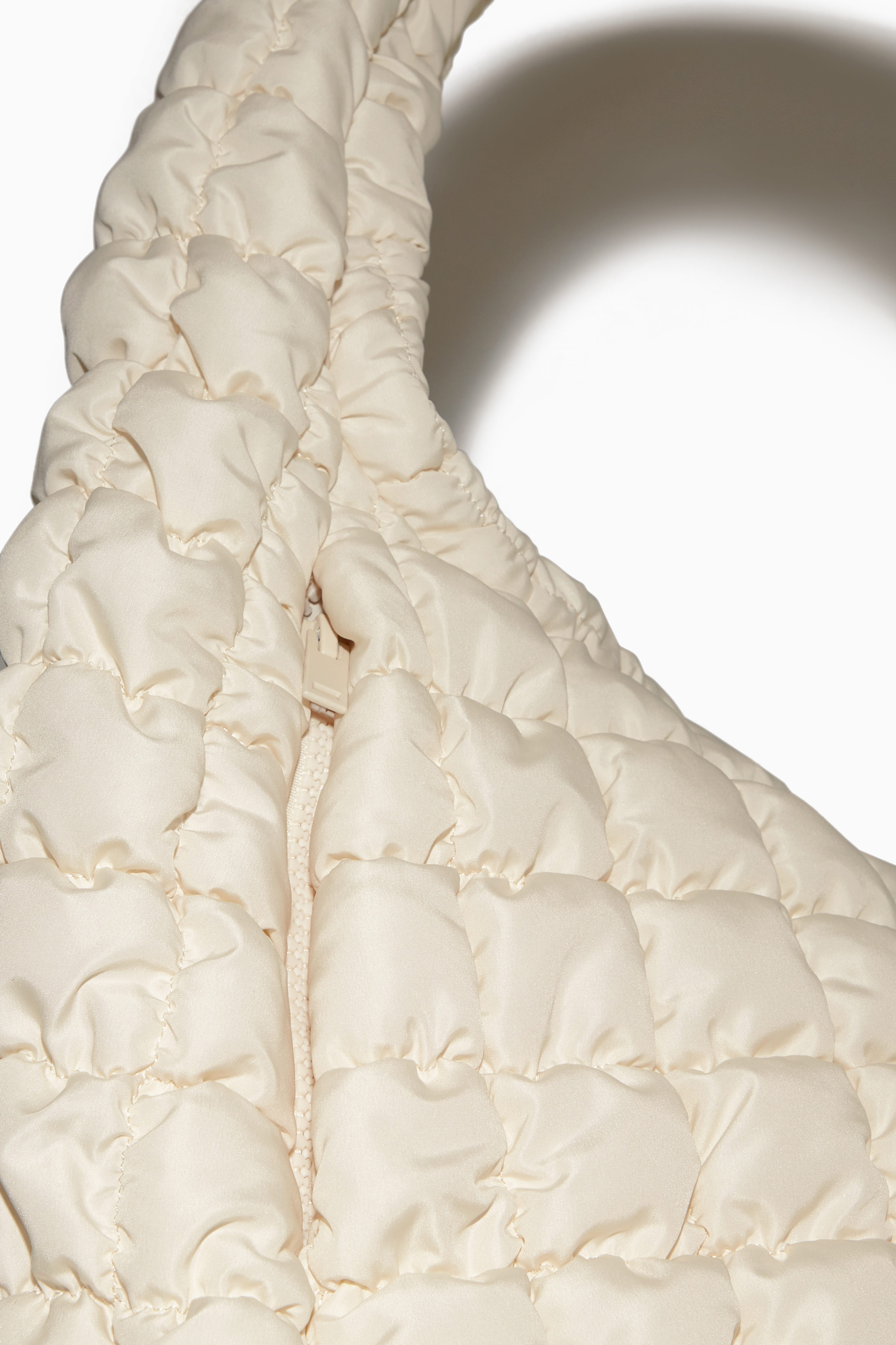 OVERSIZED QUILTED CROSSBODY BAG - BEIGE | COS