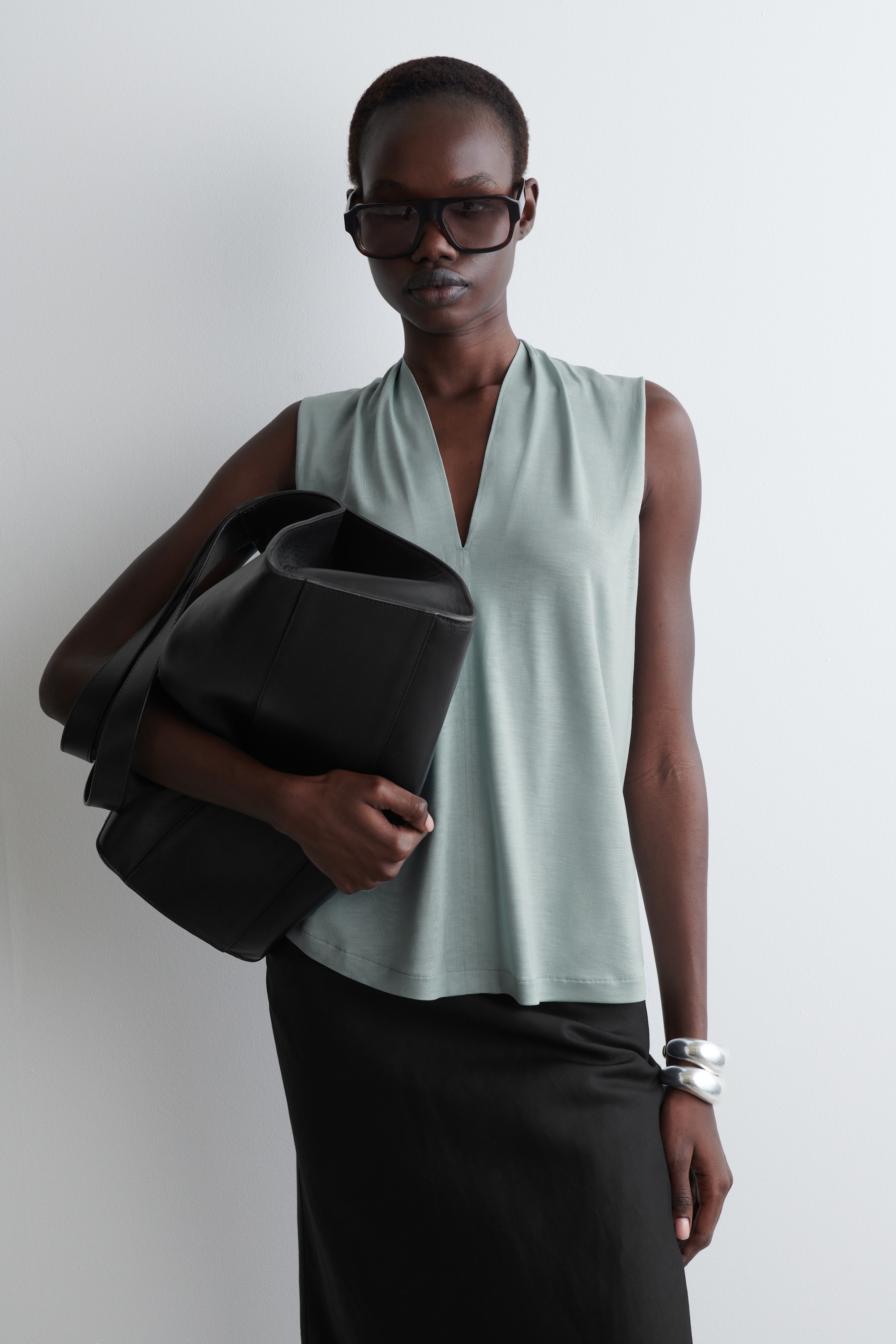 Visualizza immagine più grande: TOP CON SCOLLO A V DRAPPEGGIATO - AZZURRO - DONNA | H&M IT 1