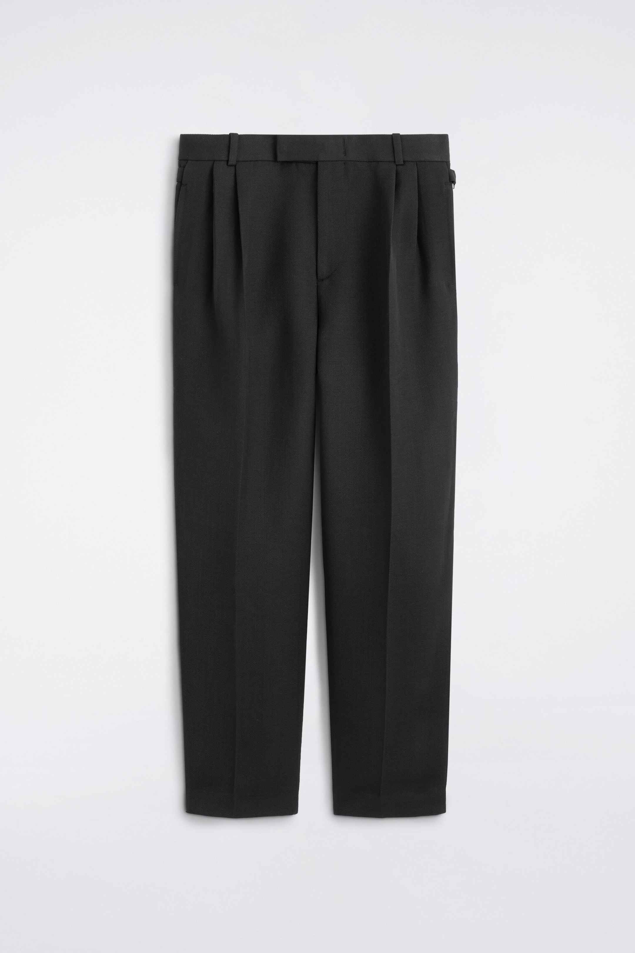 Pantalon ample à plis en mélange de laine, coupe fuselée