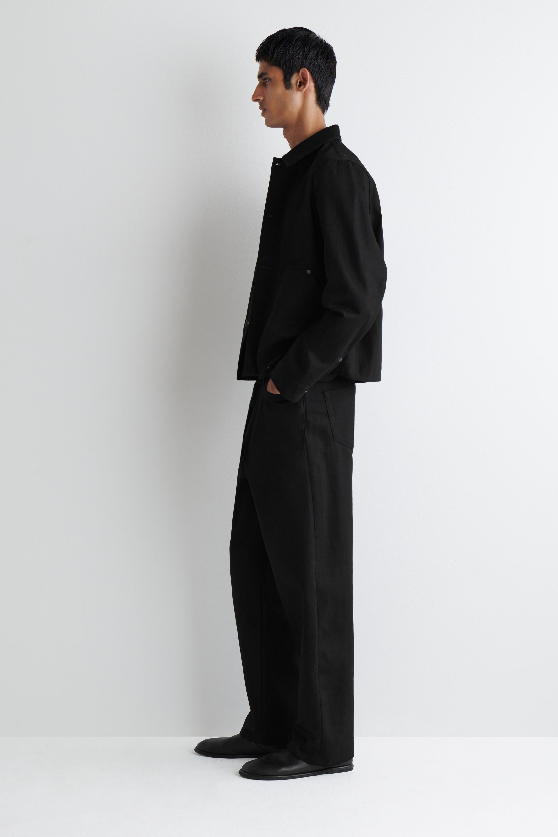 RIDER RAW SELVEDGE RELAXED-FIT STRAIGHT-LEG JEANS - BLACK | COS US
