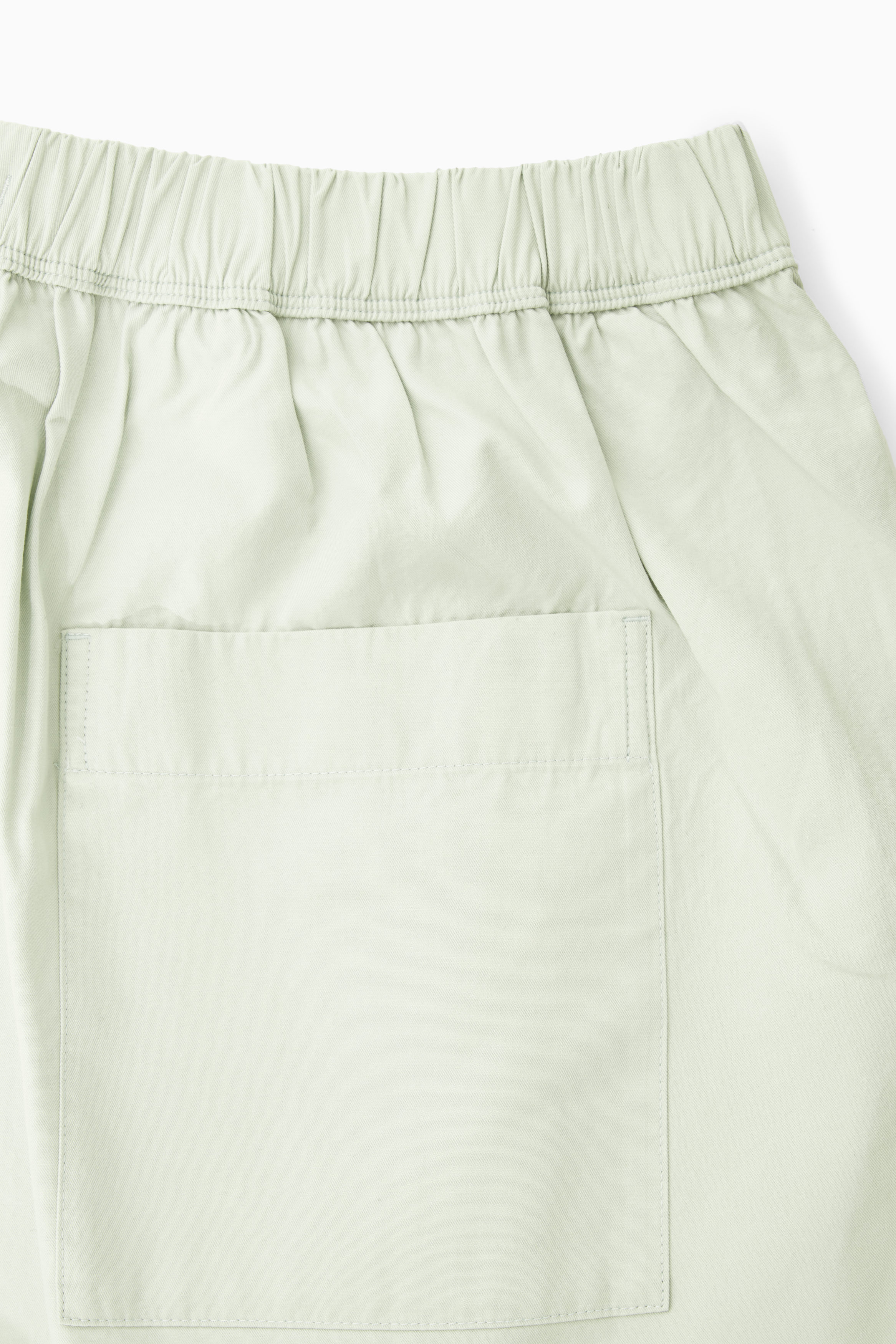 WIDE-LEG ELASTICATED TROUSERS - LIGHT GREEN | COS