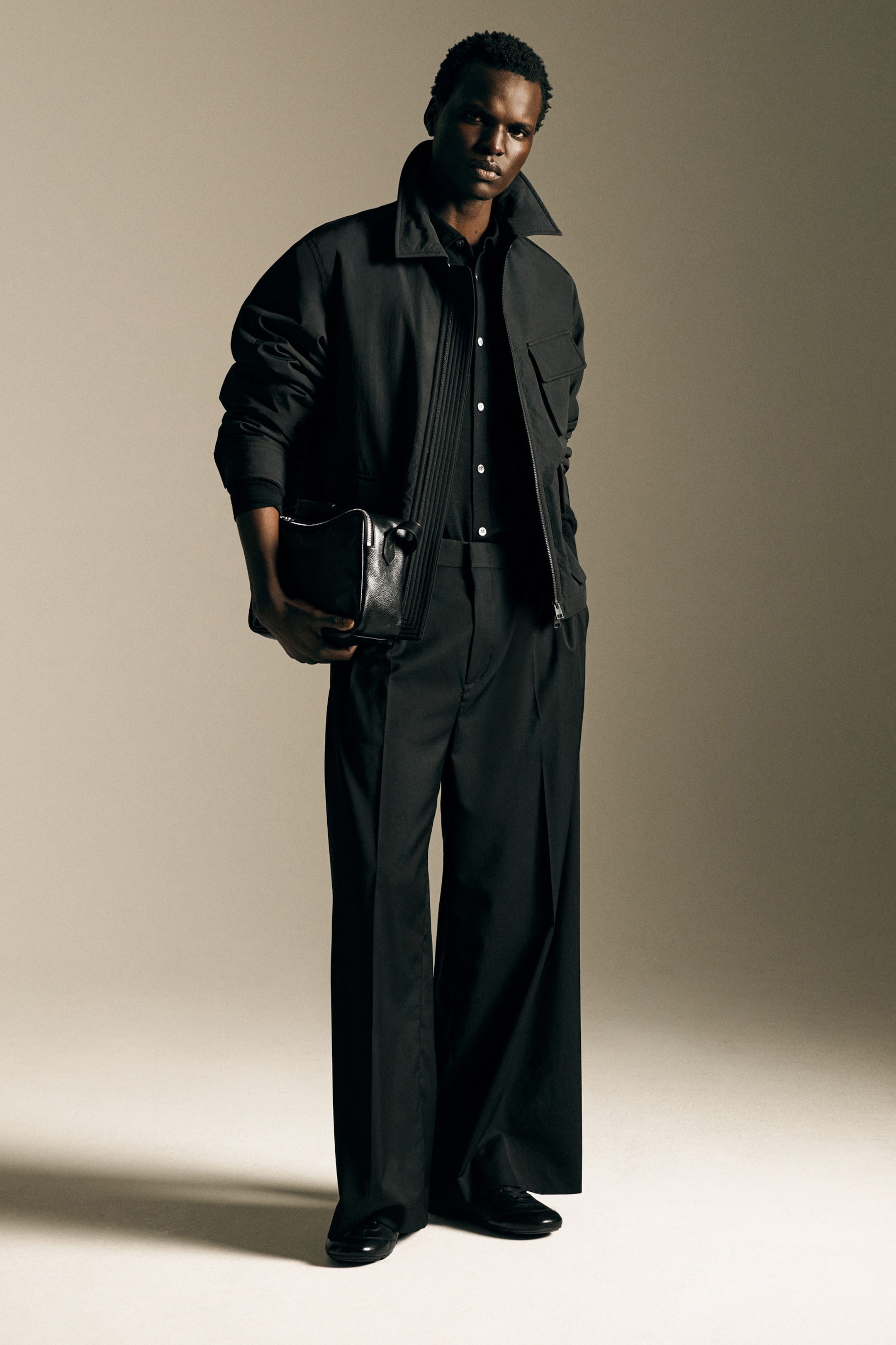 PLEATED WOOL RELAXED-FIT WIDE-LEG TROUSERS