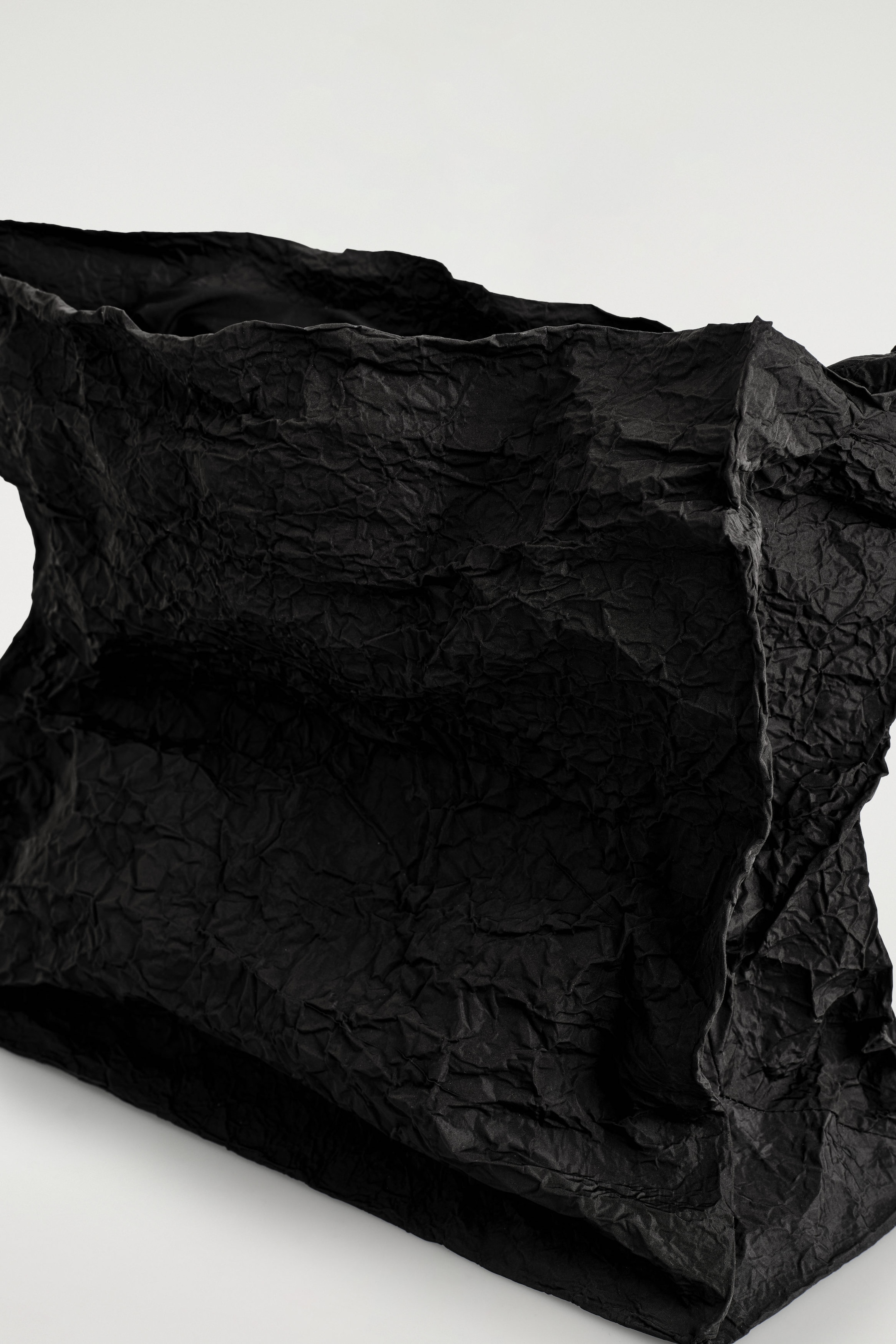 FOLDED OVERSIZED CLUTCH BAG