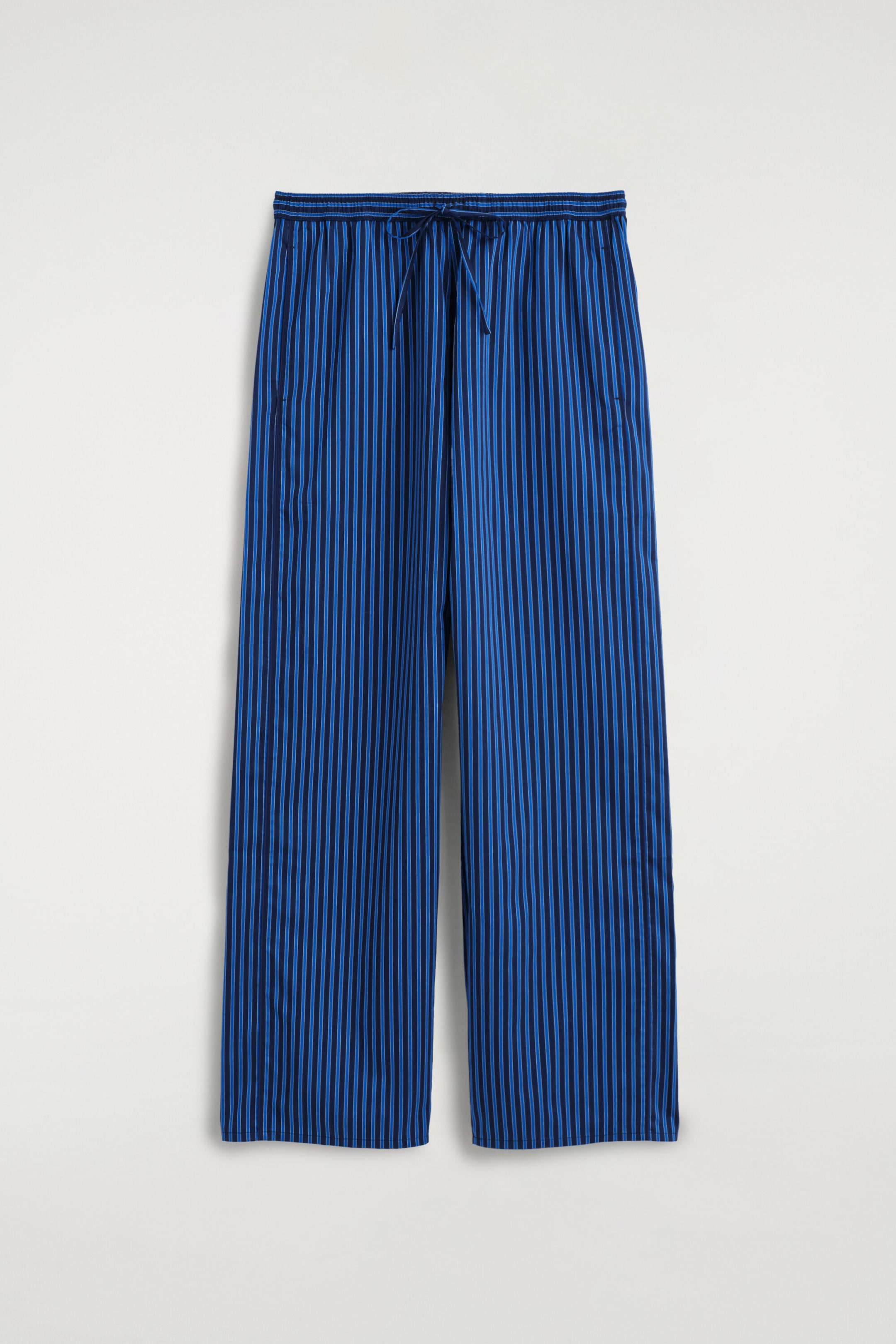 PANTALON RAYÉ À PASSEPOILS ET TAILLE ÉLASTIQUÉE