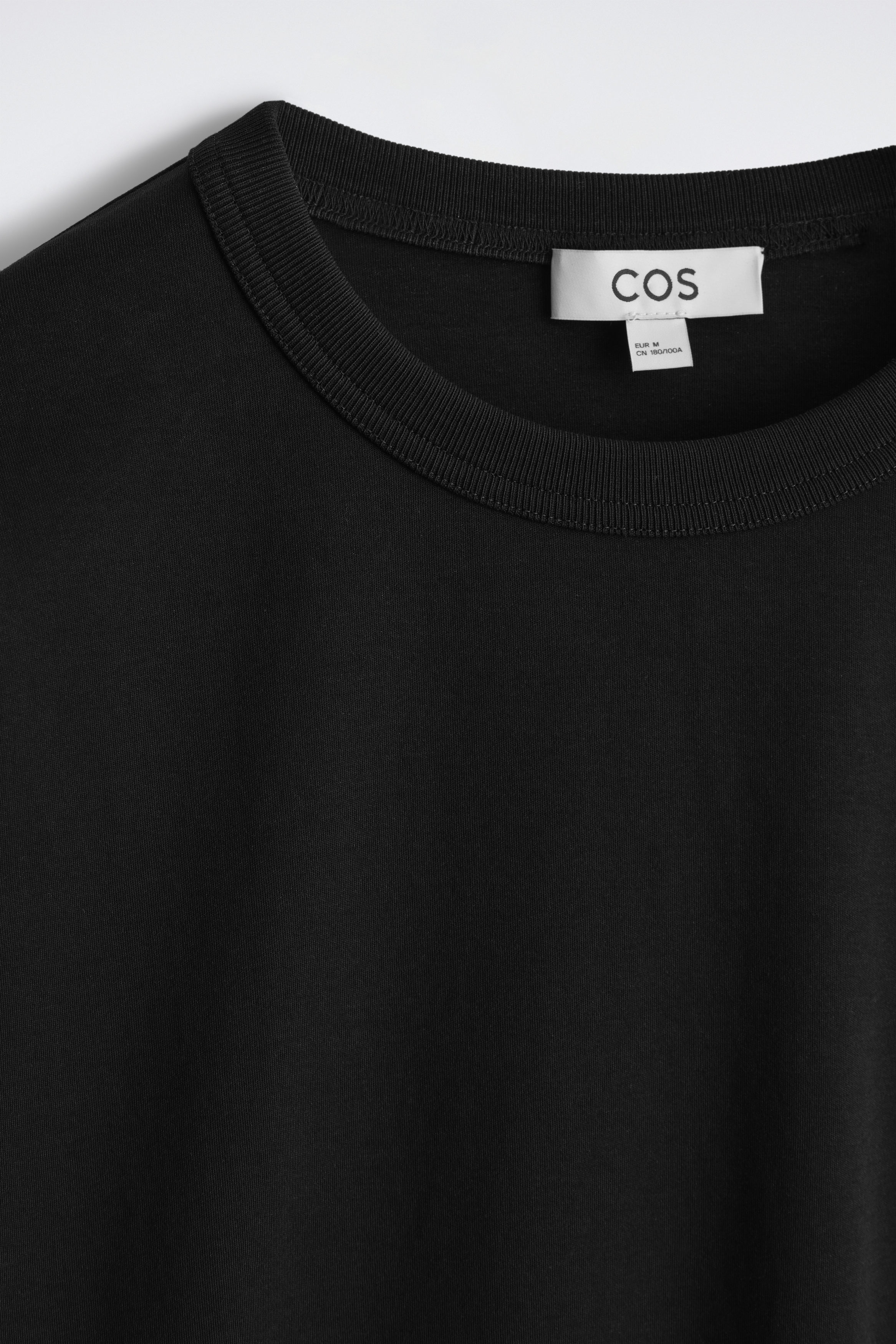 RELAXED JERSEY INTERLOCK LONG-SLEEVED T-SHIRT - BLACK | COS