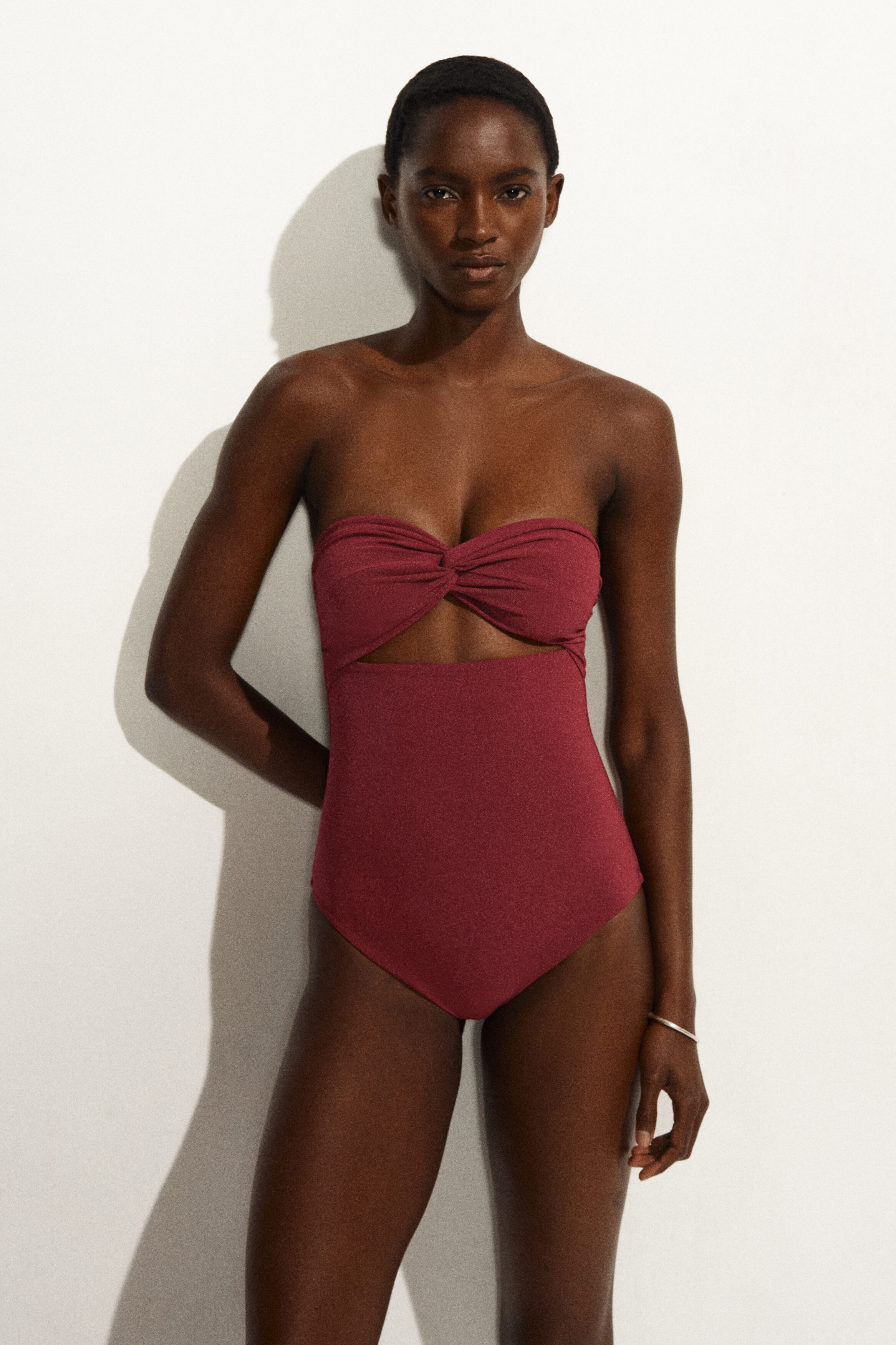 TWISTED TEXTURED CUTOUT SWIMSUIT - RUST | COS NL