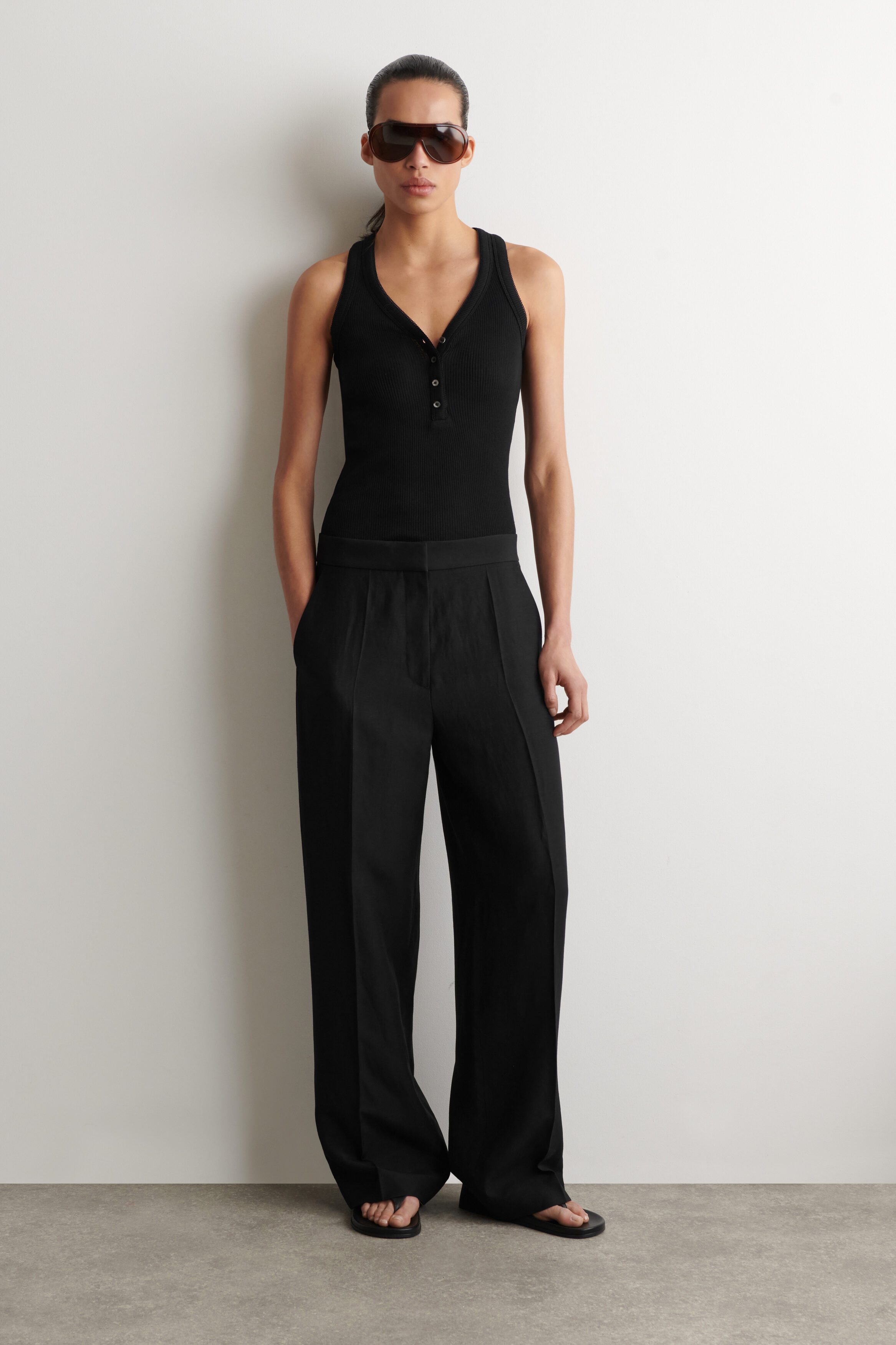 RIBBED-KNIT HENLEY TANK TOP - BLACK | COS US