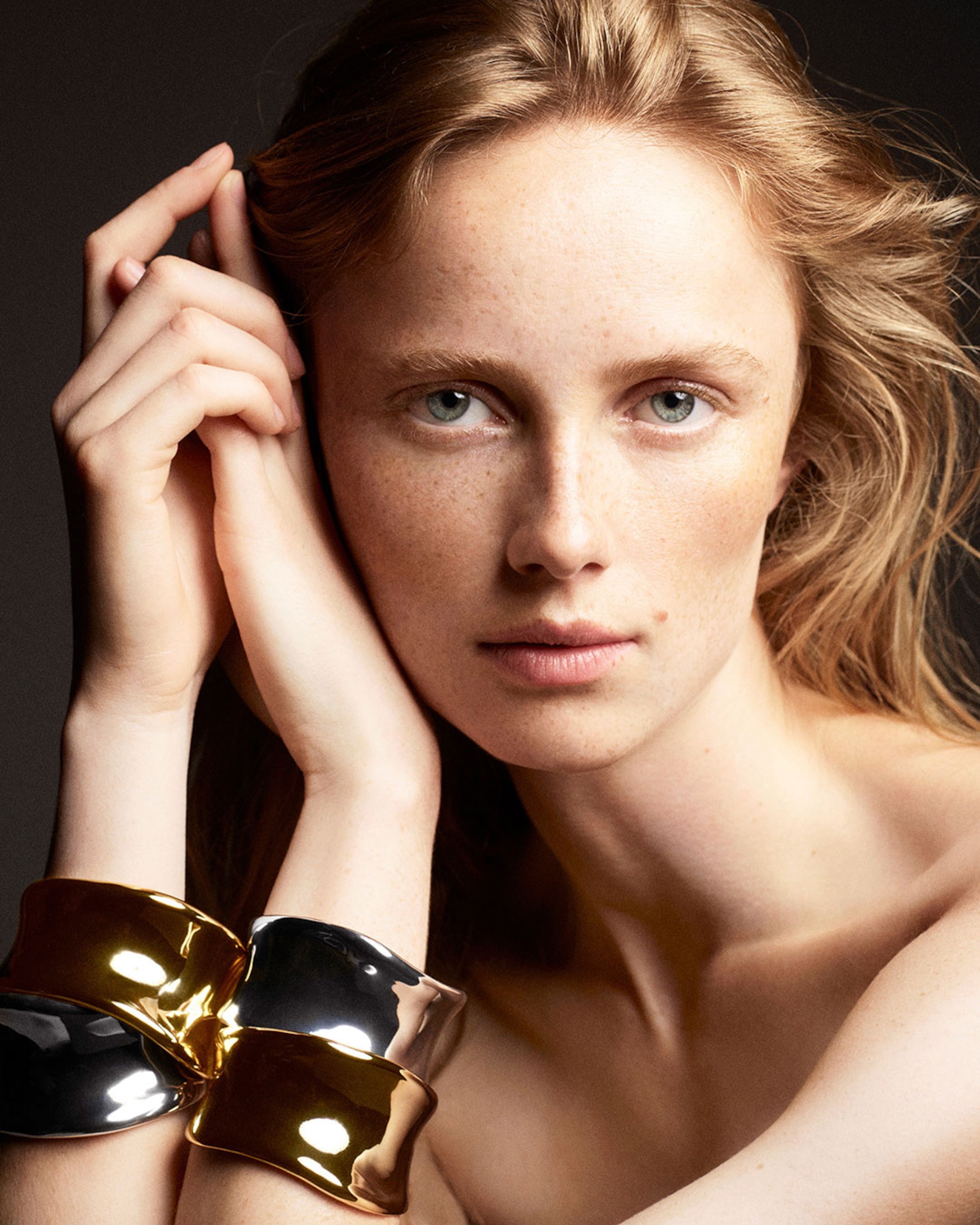 Woman with mixed metal bangles