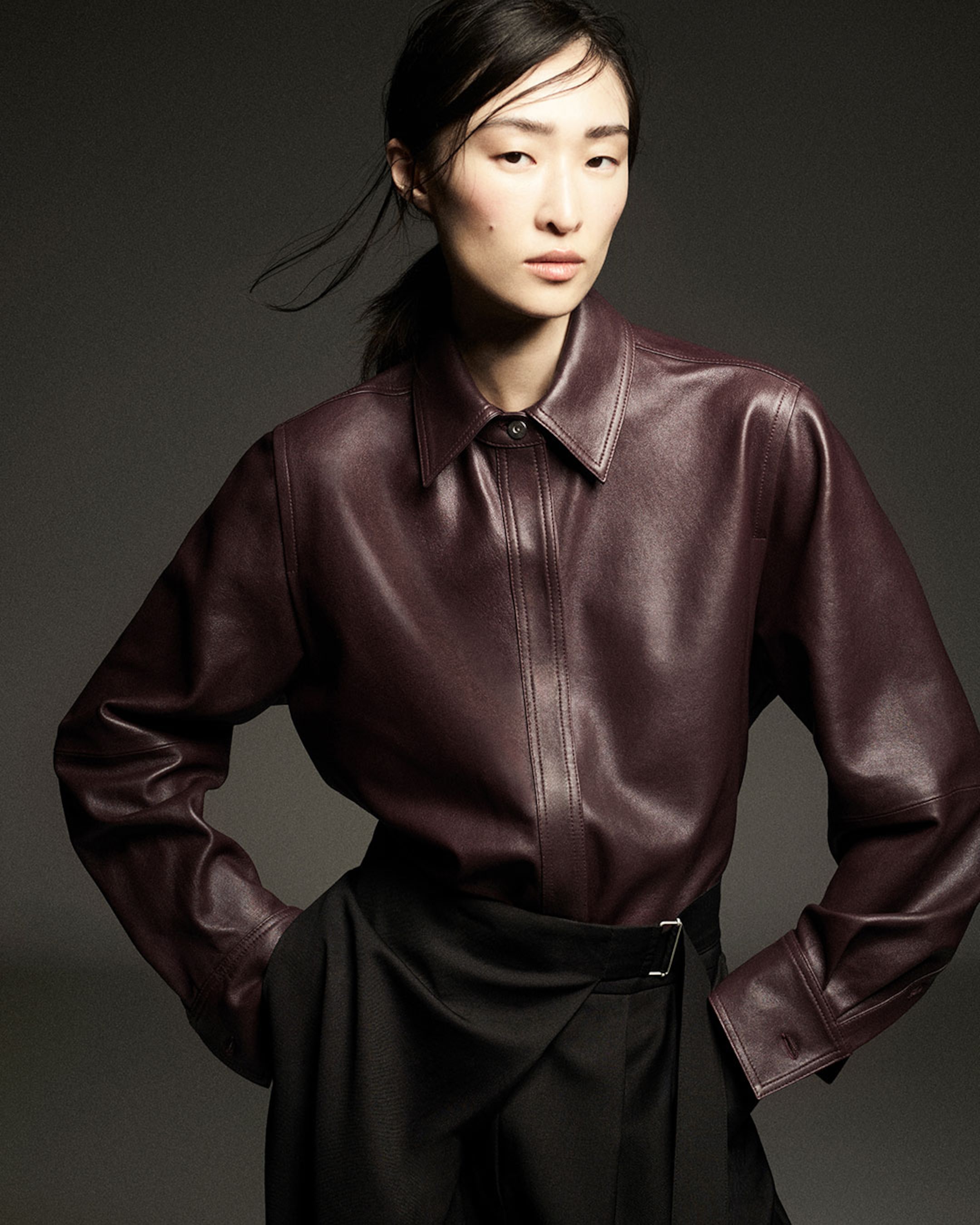 woman in leather top