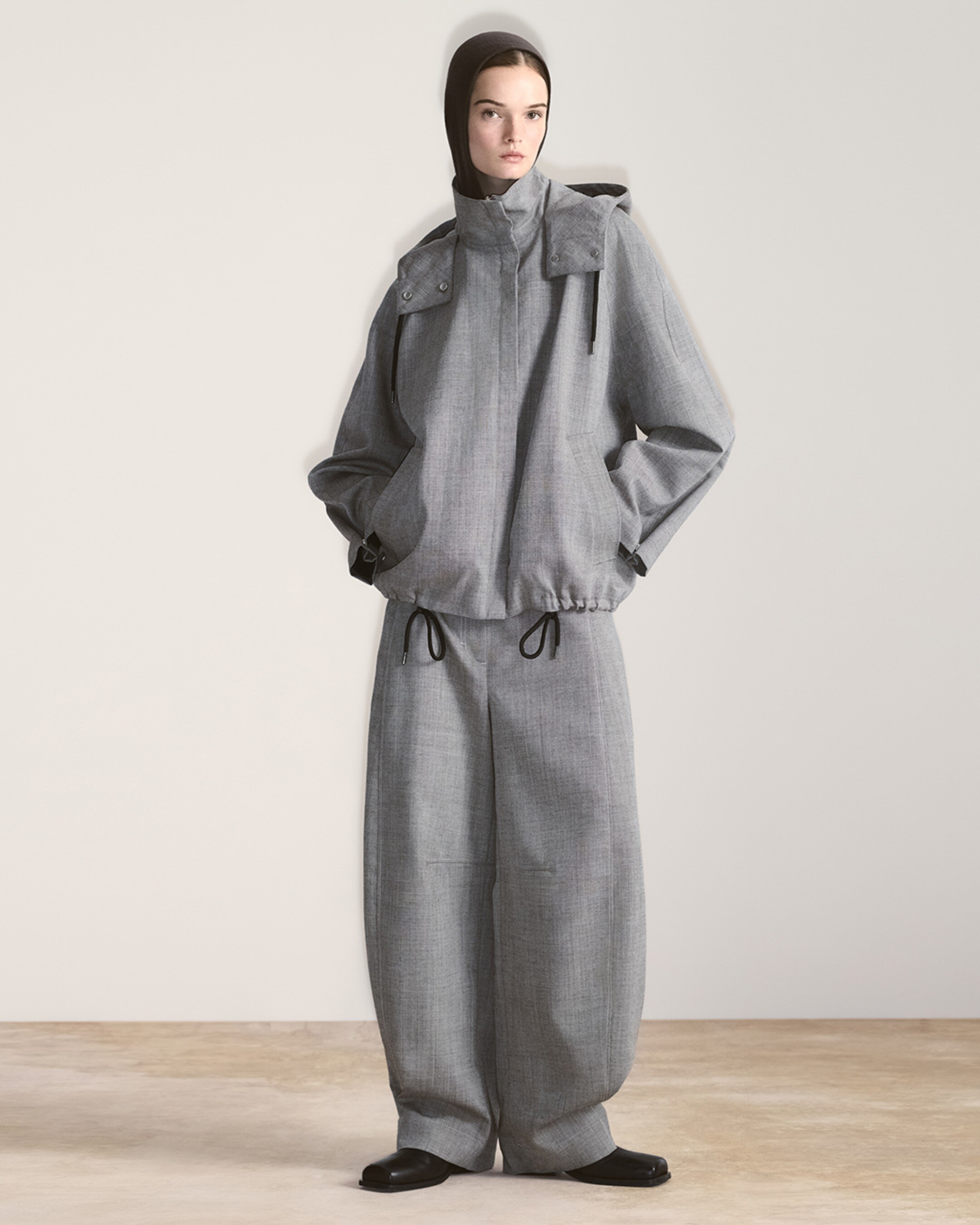 woman in grey matching set